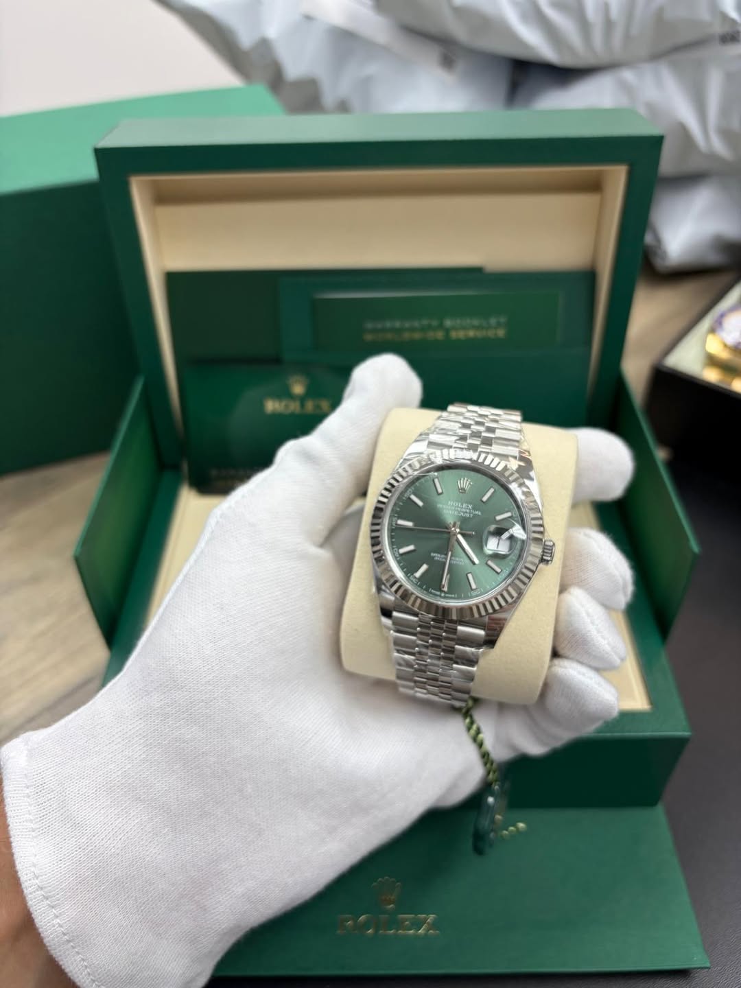 May be an image of wrist watch and text