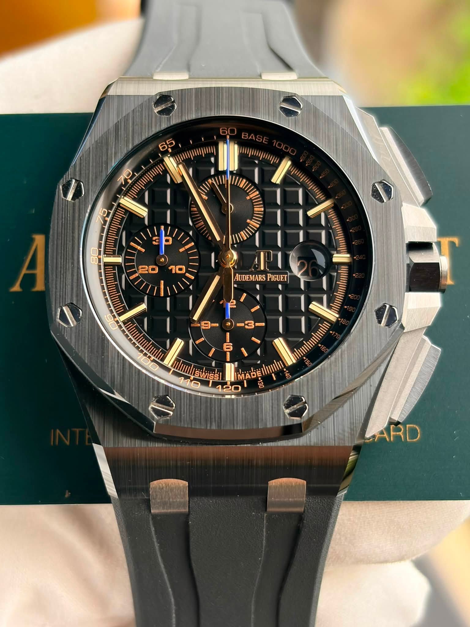May be an image of wrist watch and text
