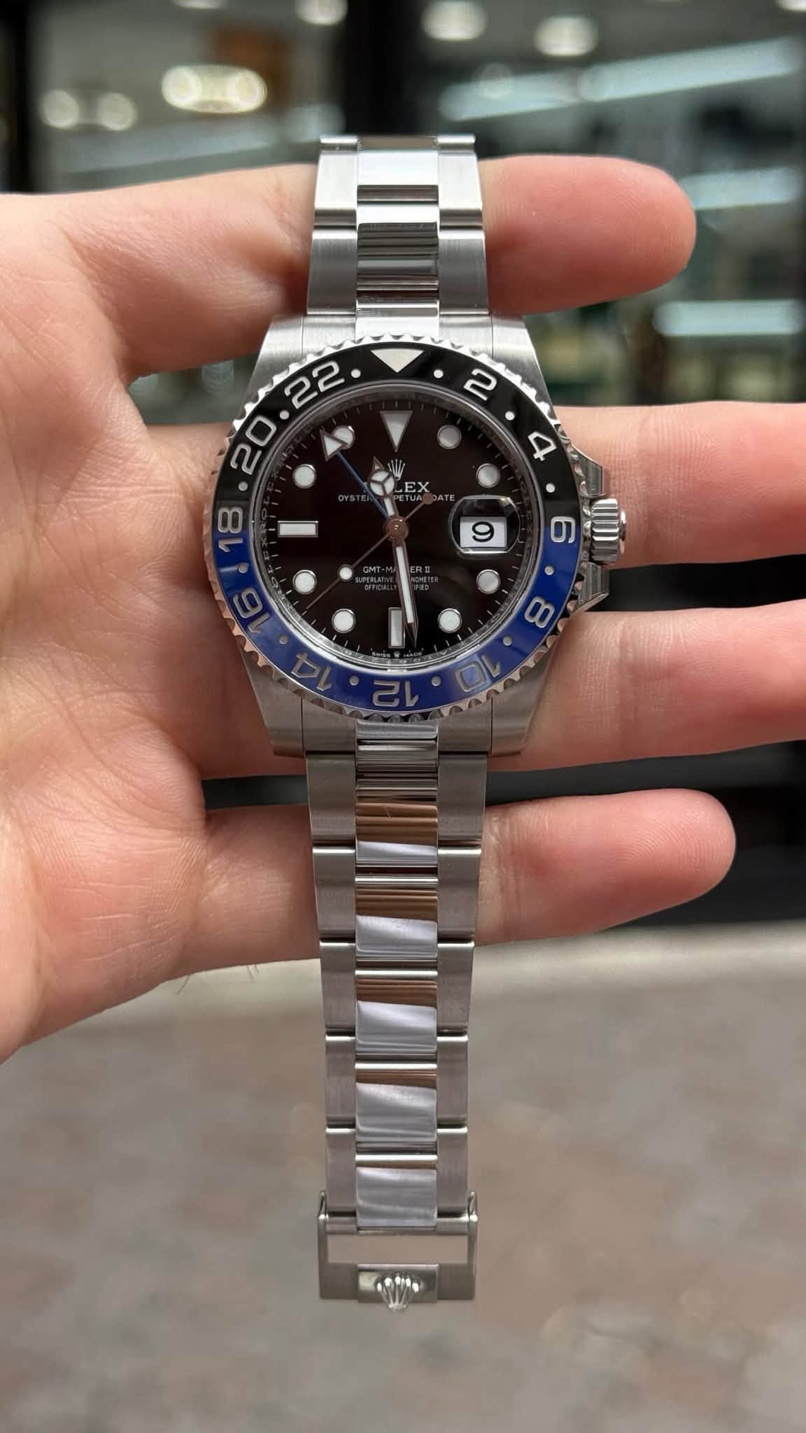 May be an image of wrist watch and text