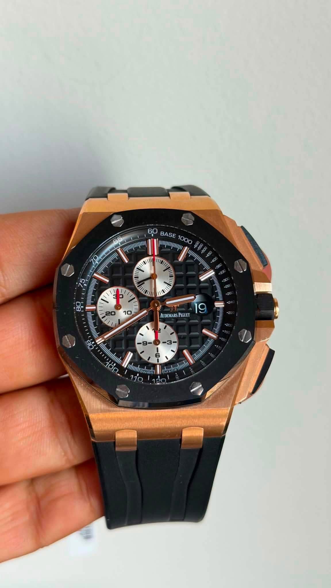 May be an image of wrist watch and text