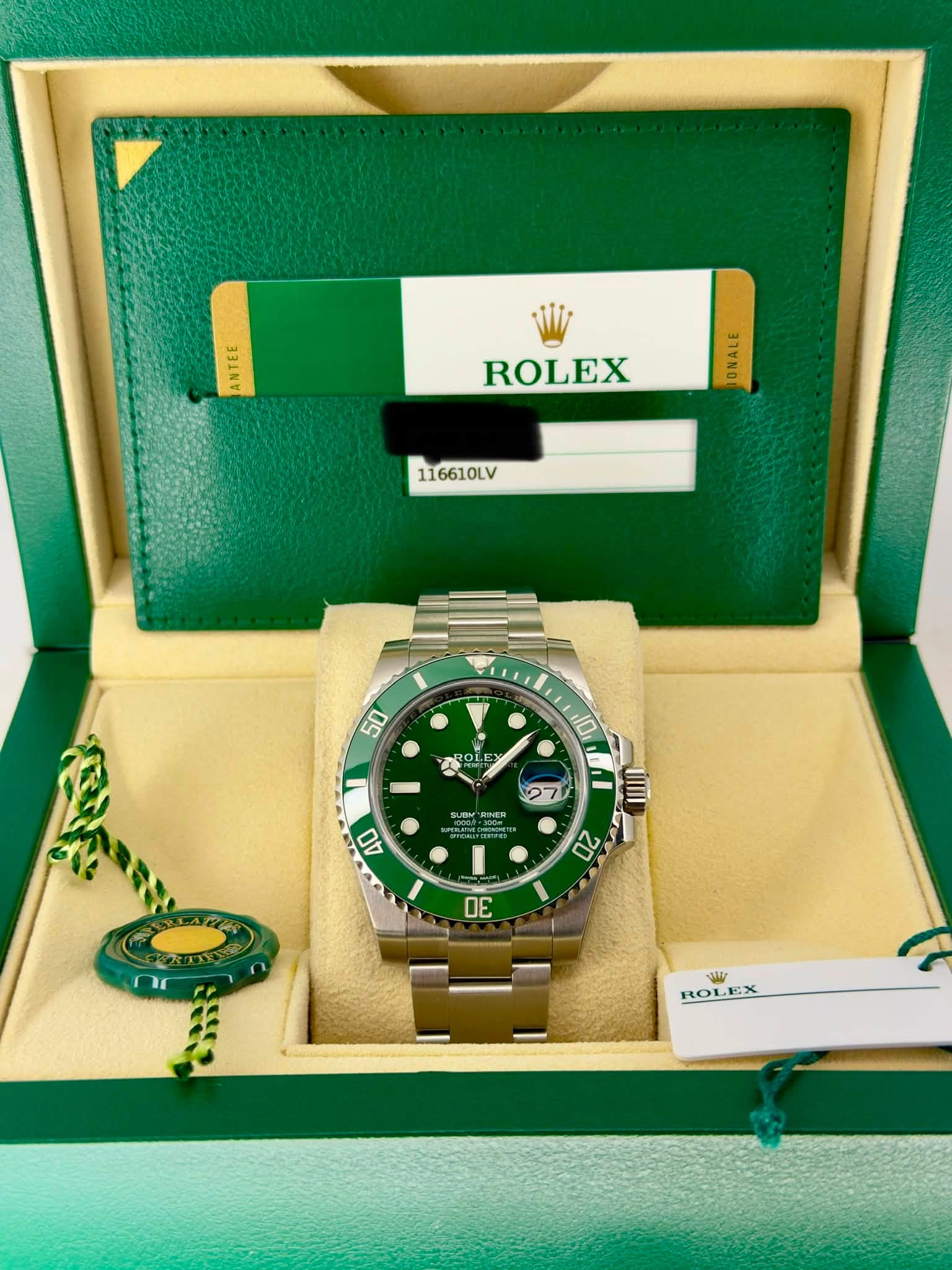 May be an image of wrist watch and text that says '公 ANTEE ROLEX ONALE 116610LV 50 RO R0L DLE 10 MI ÚMI 27 SUBI RIMER oo SA 40 20 ΔΕ للي ROLEX EX ROL'