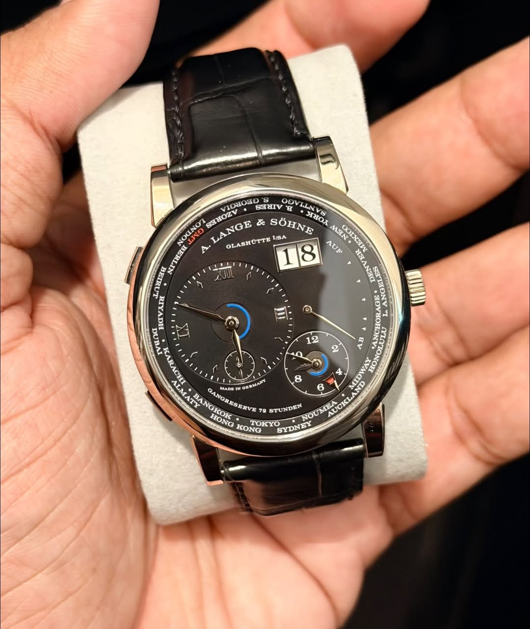May be an image of wrist watch and text