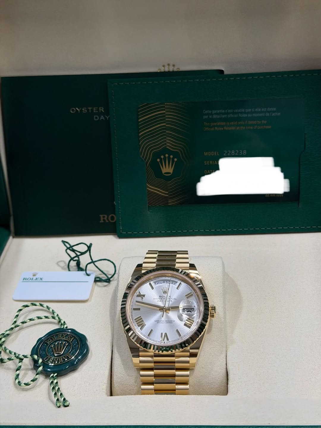 May be an image of wrist watch and text