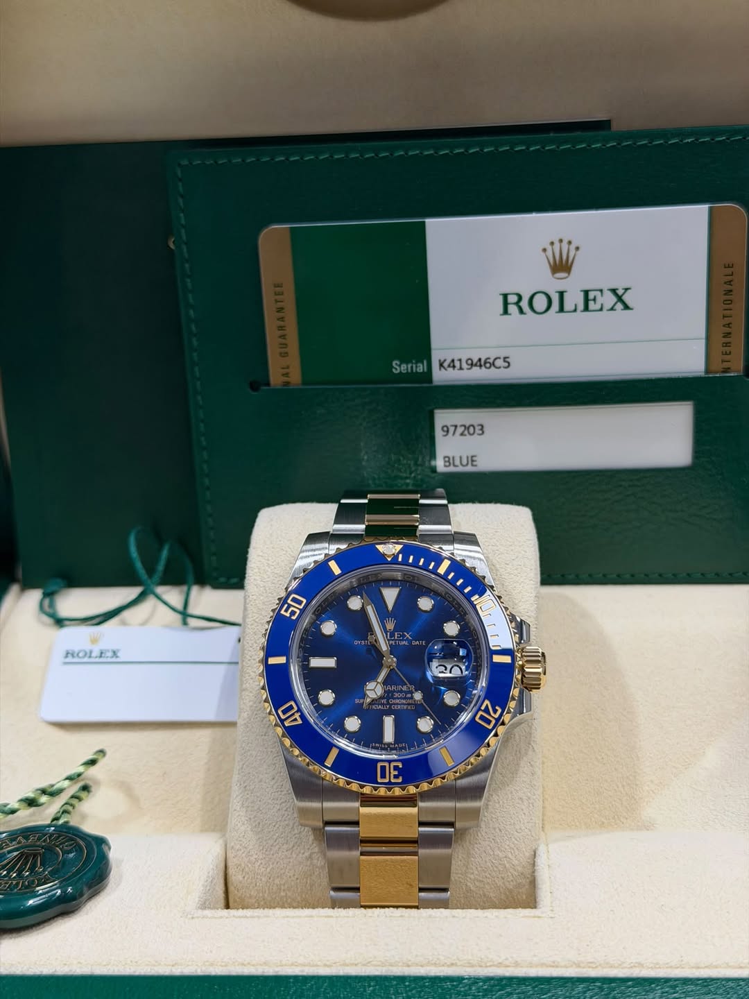 May be an image of wrist watch and text that says 'ROLEX Serial K41946C5 97203 BLUE ROLEX 50 I 20 H 40 20 30'