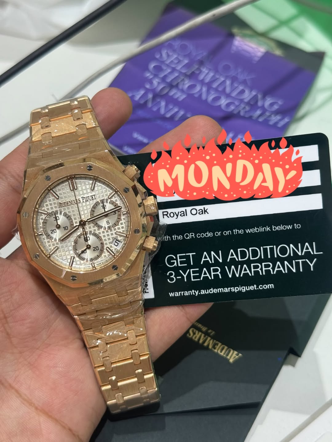 May be an image of wrist watch and text that says 'SEL 15m AUTEMARS የማሓን 10 20 8 I MONDAY Royal Oak 20 5 3aHAaaeKo t ith the QR code or on the weblink below to GET AN ADDITIONAL…
