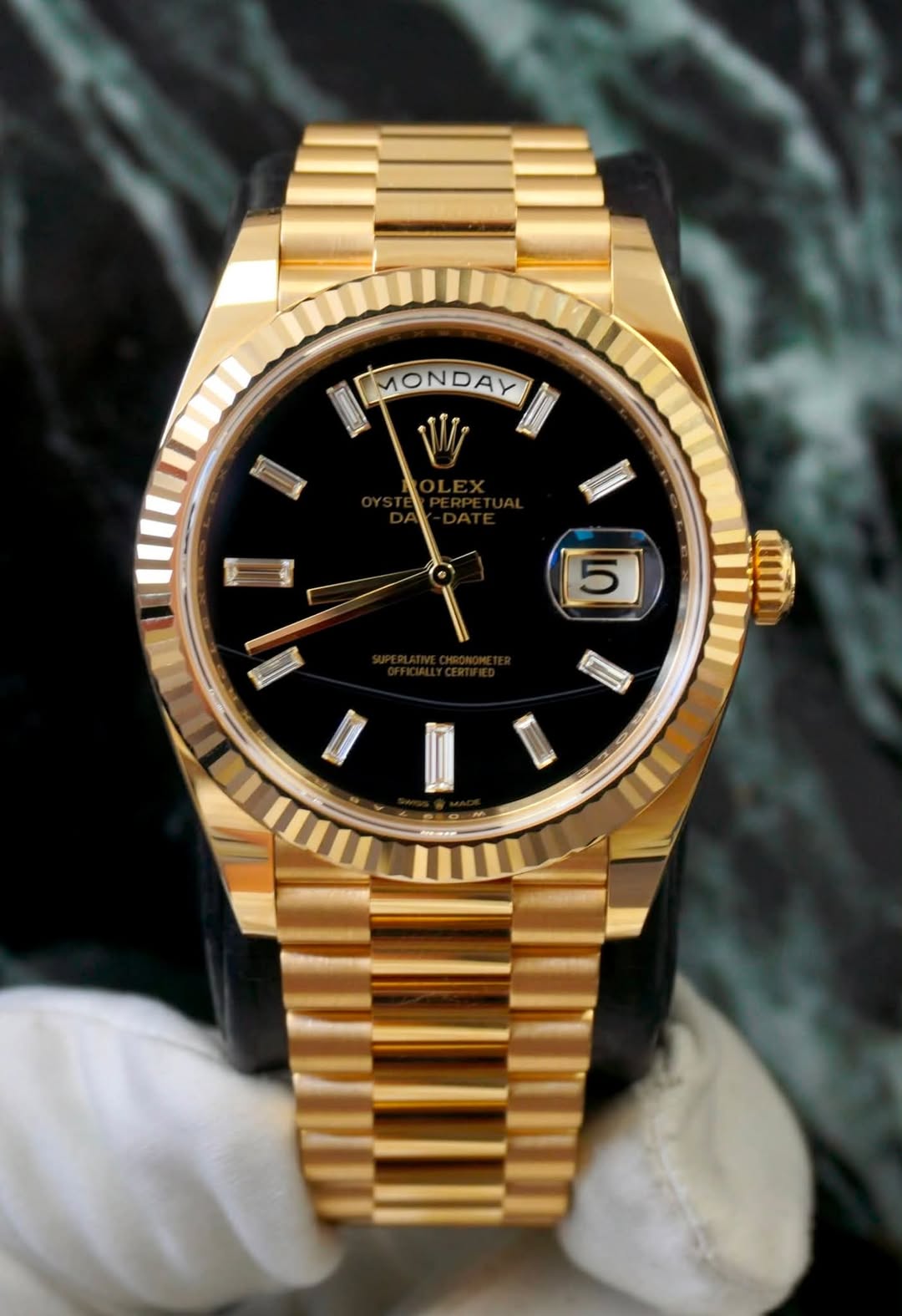May be an image of wrist watch and text