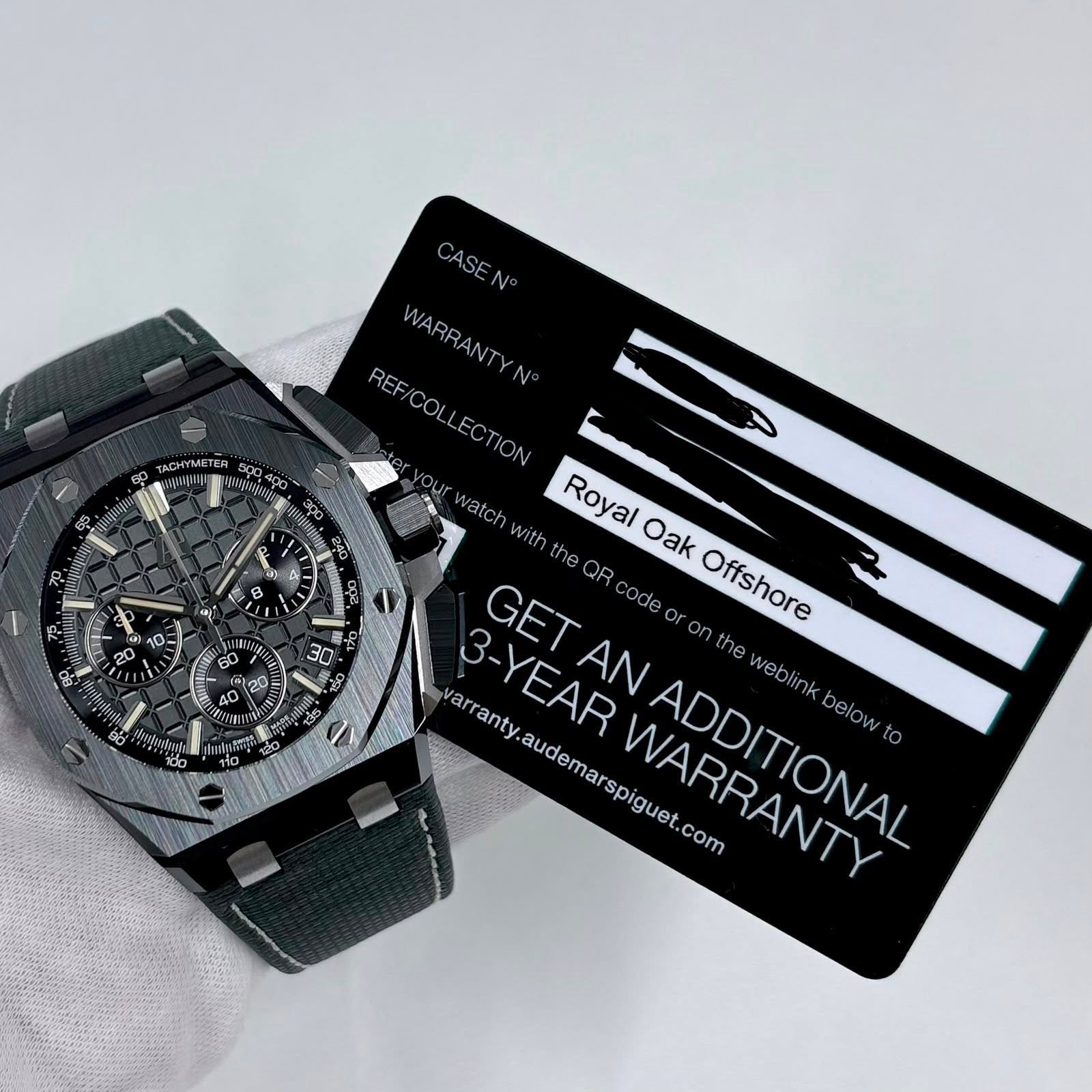 May be an image of digital watch and text that says 'TACHYME සං መጥ 500 မ0400 Nyhoges noлn 30 H CASEN REF/COLLECTION COLLECTION REF WARRANTYN vatch with Royal the Oak GET QR ode O…