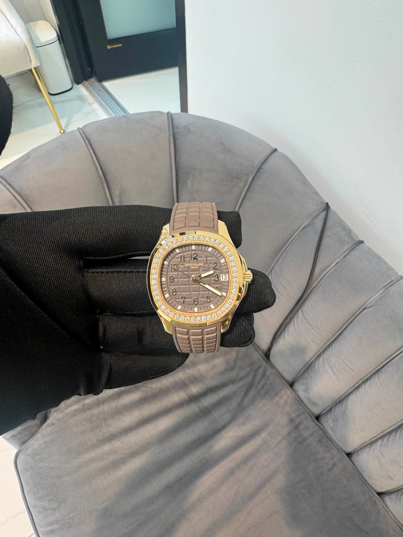May be an image of wrist watch and text