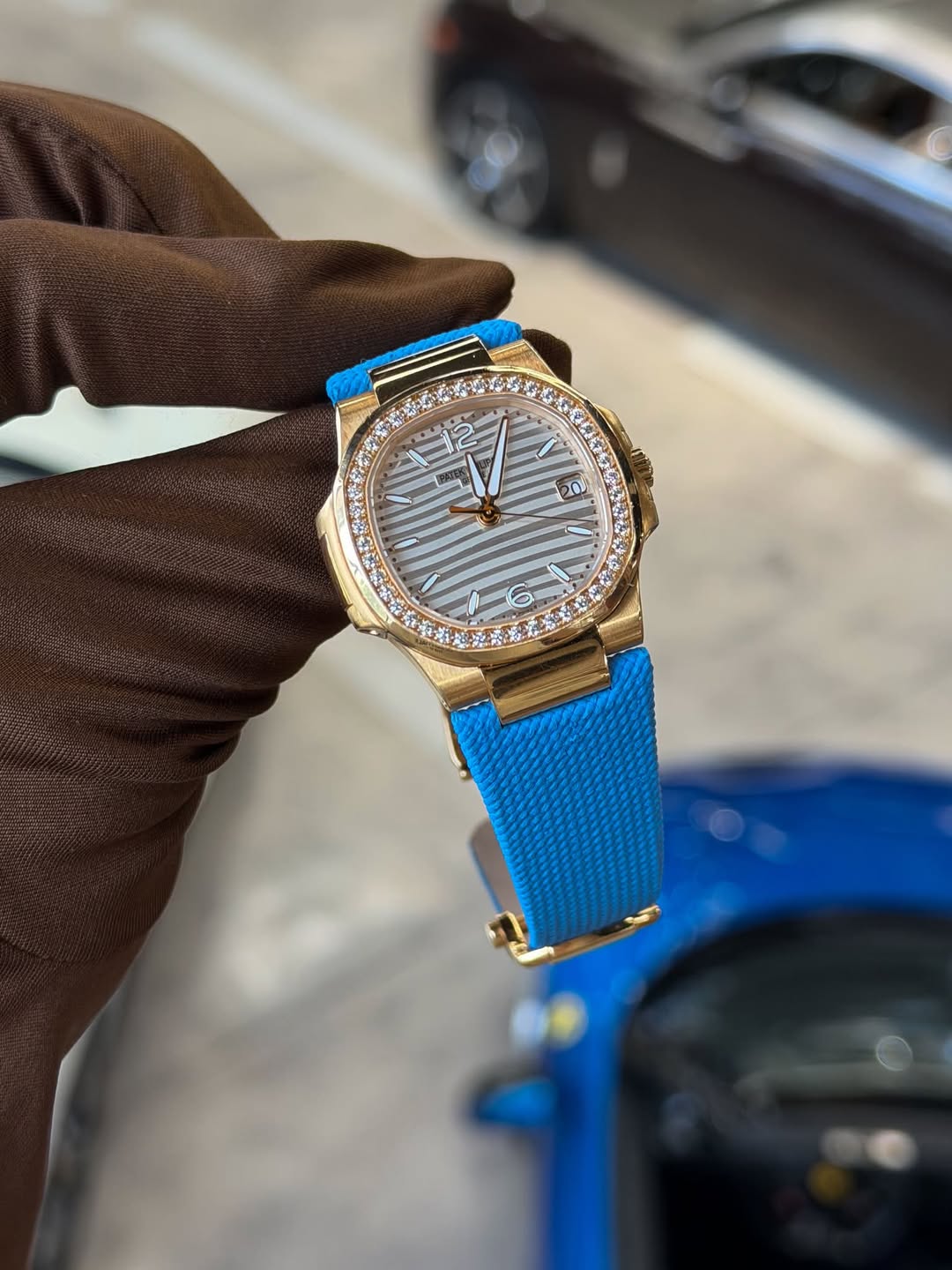 May be an image of wrist watch and text