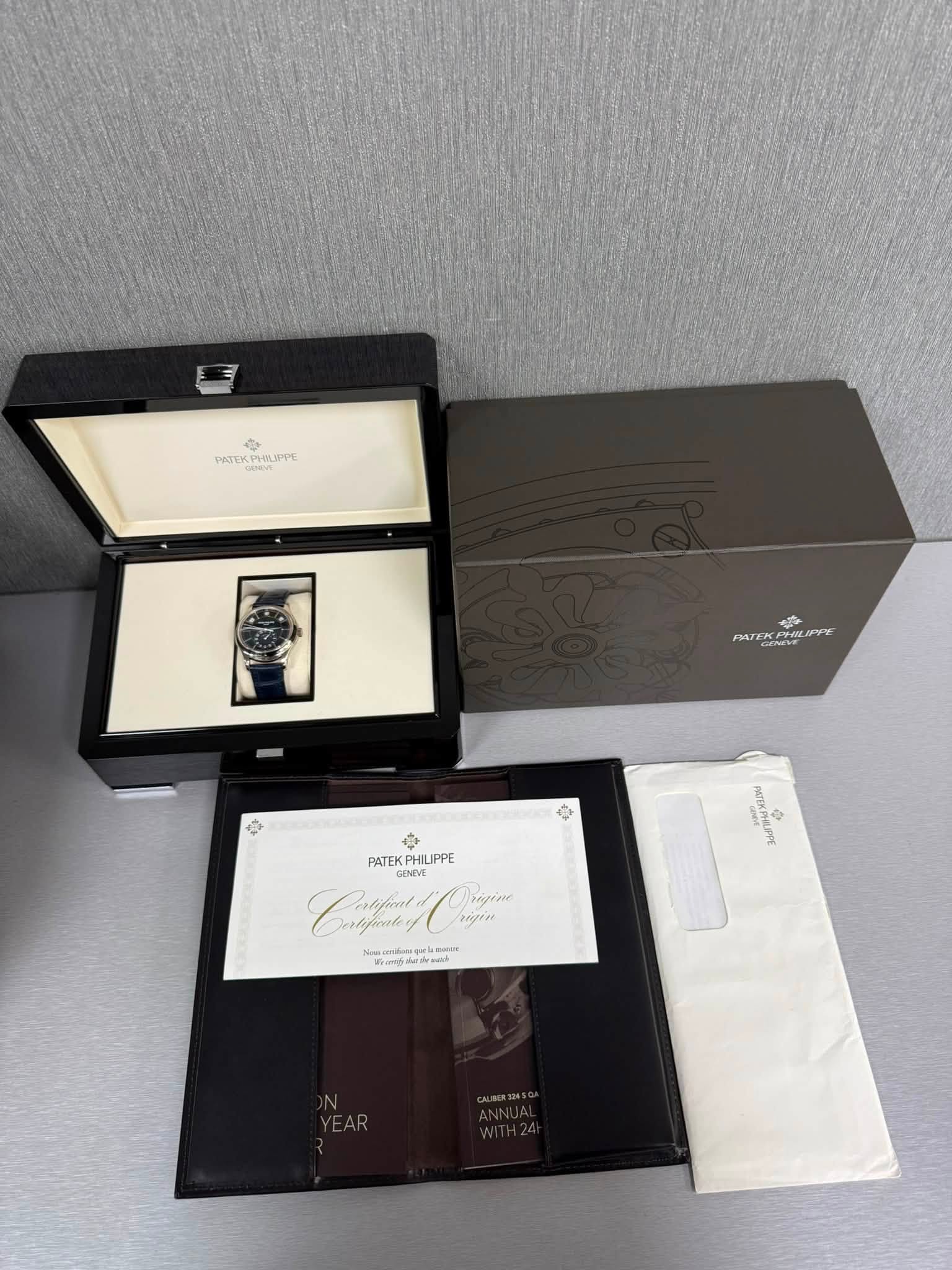 May be an image of fragrance, wrist watch and text