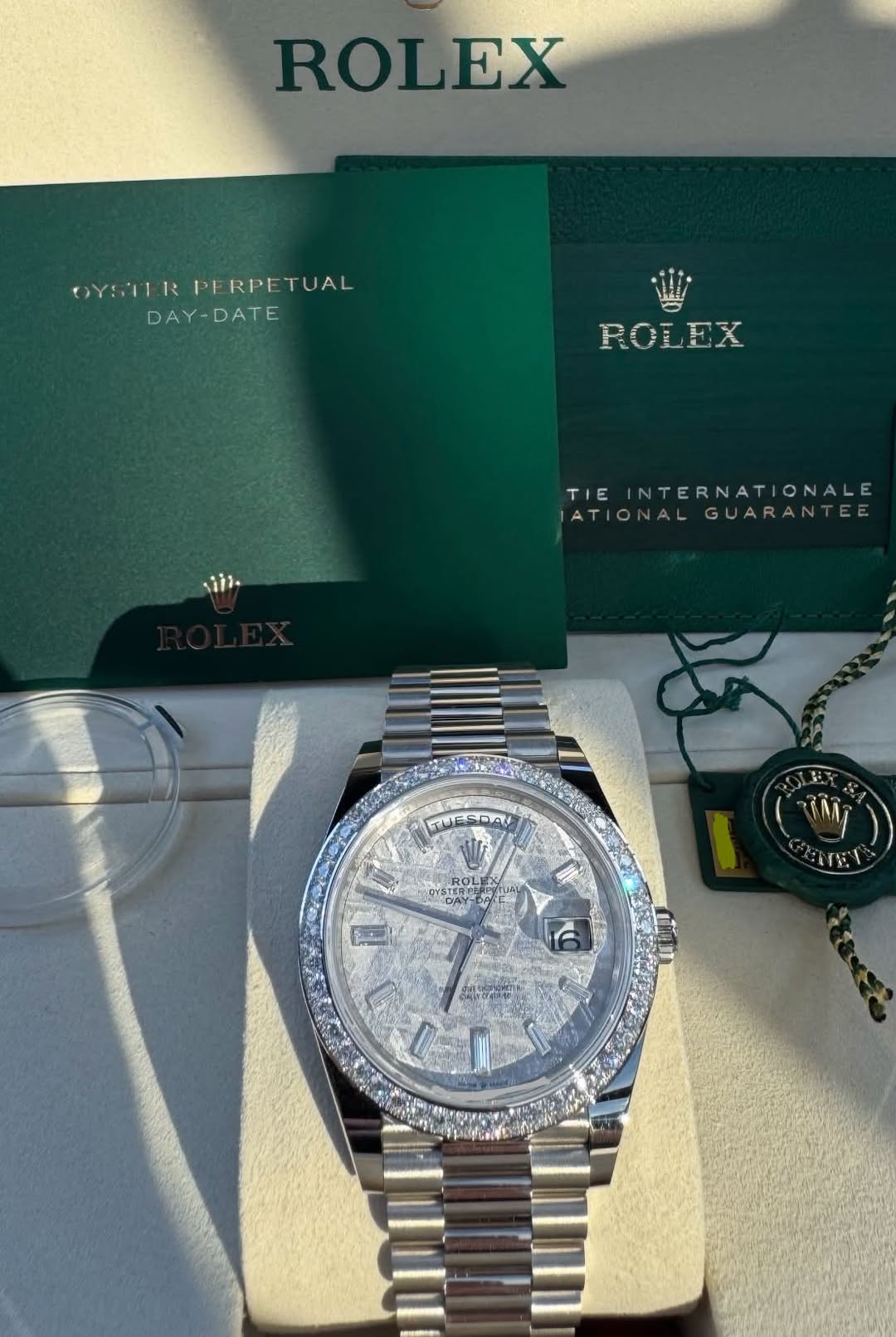 May be an image of wrist watch and text