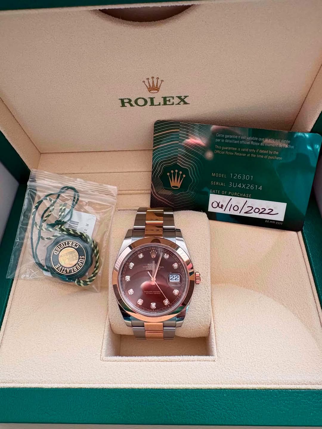 May be an image of wrist watch and text that says 'WI ROLEX BU4X2614 04/10/2022 0e/10 2022 CEEILEES TAL በያ ้กร की 22 மா 會'