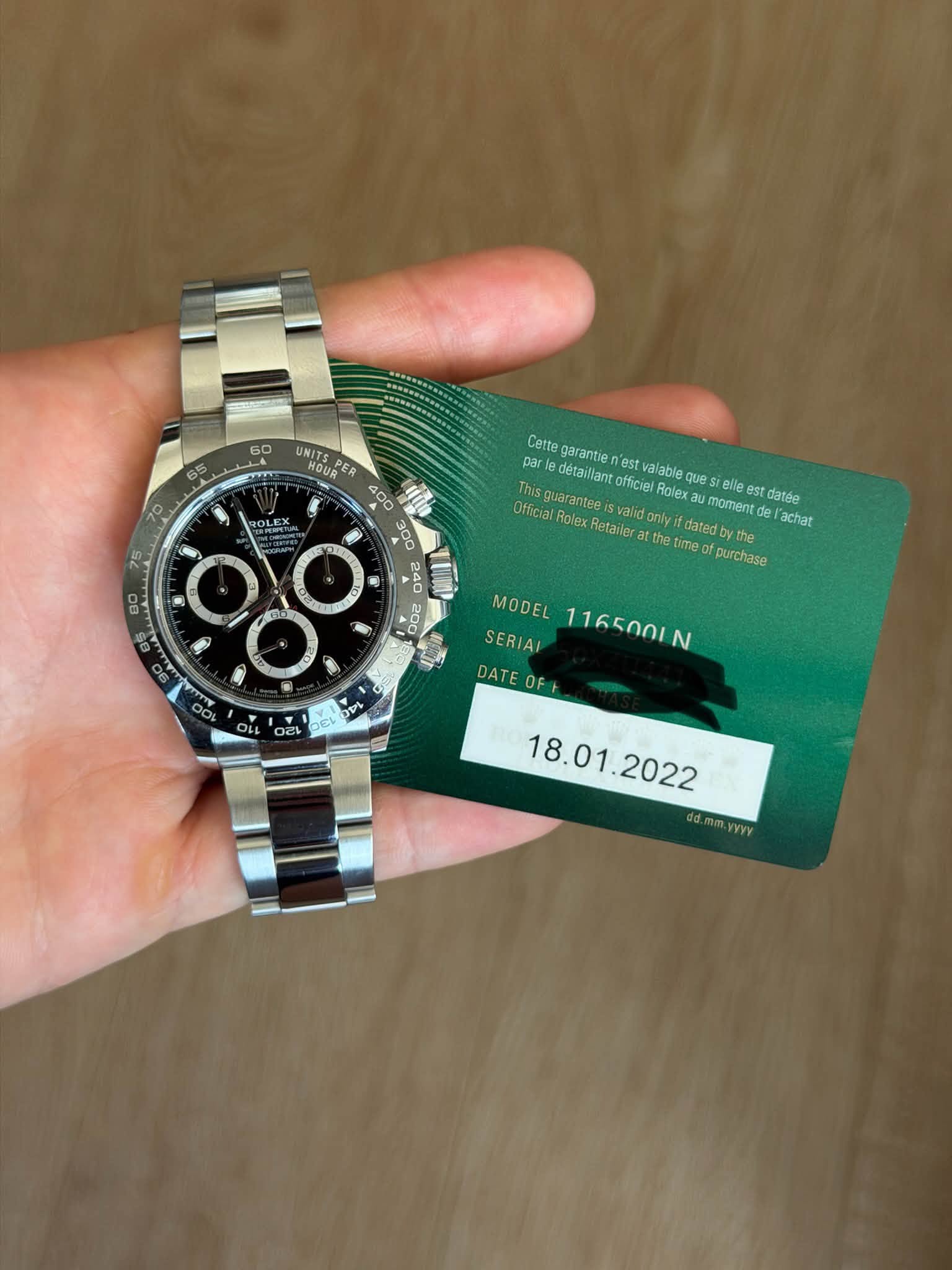 May be an image of wrist watch and text that says '60 65 UNIT หองพ PER OLOA 0 R: 80 Cette garantien valable par détaillant official Rolex elle est datée Official Retailer the tume…