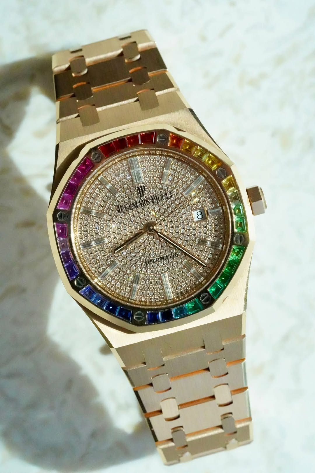 May be an image of wrist watch and text