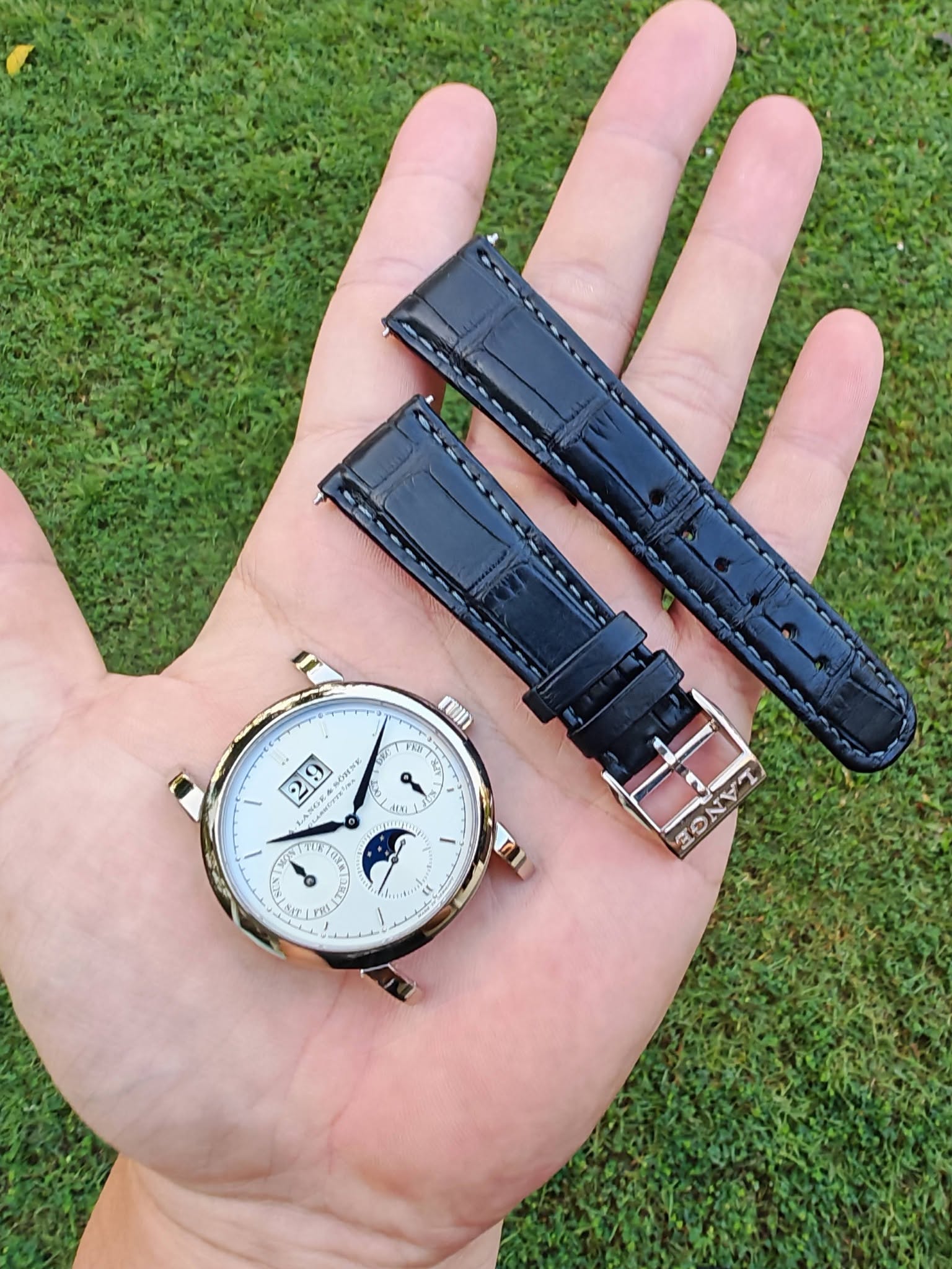 May be an image of digital watch and text