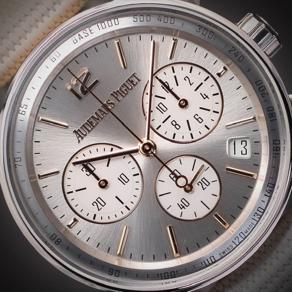 May be an image of wrist watch and text that says ' ن み BASE100 1000 BASE 60 1 ١ 1I ال AUDEMANSPIGUET PIGUET AUDEMA D ن ..O 4 20 40 c Do 70 13 3 D 20 I 3D 20MADE SWISS 10'