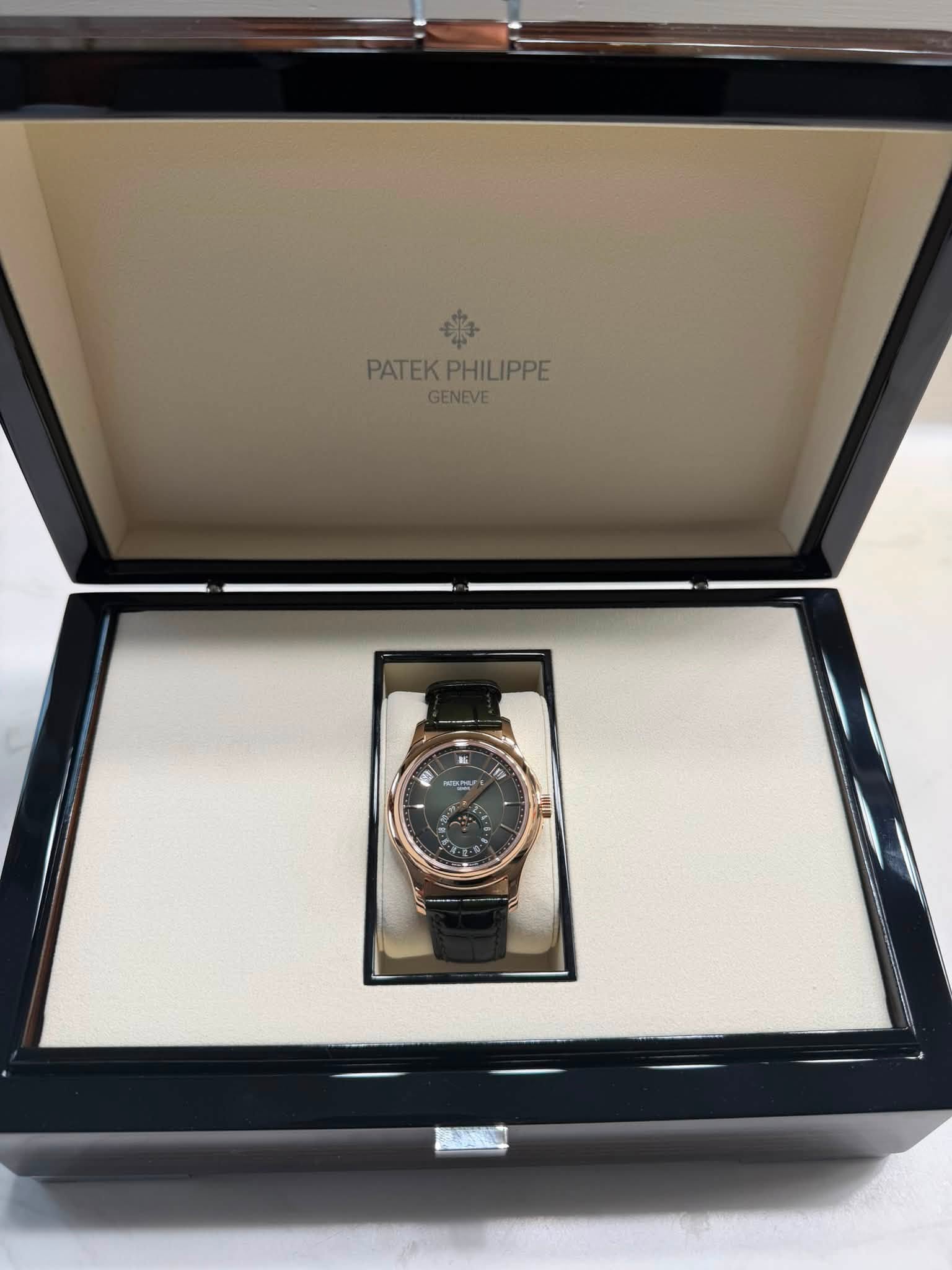 May be an image of wrist watch and text that says 'PATEKPHILIPPE PATEK| GENEVE ND PA o'