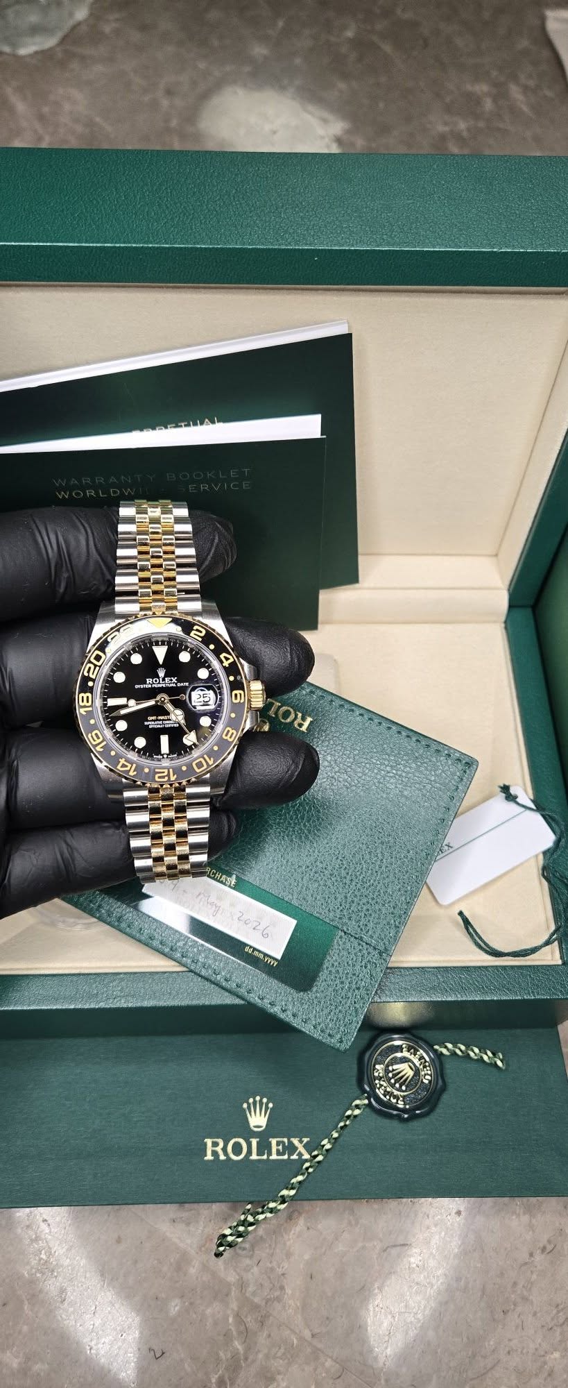 May be an image of wrist watch and text