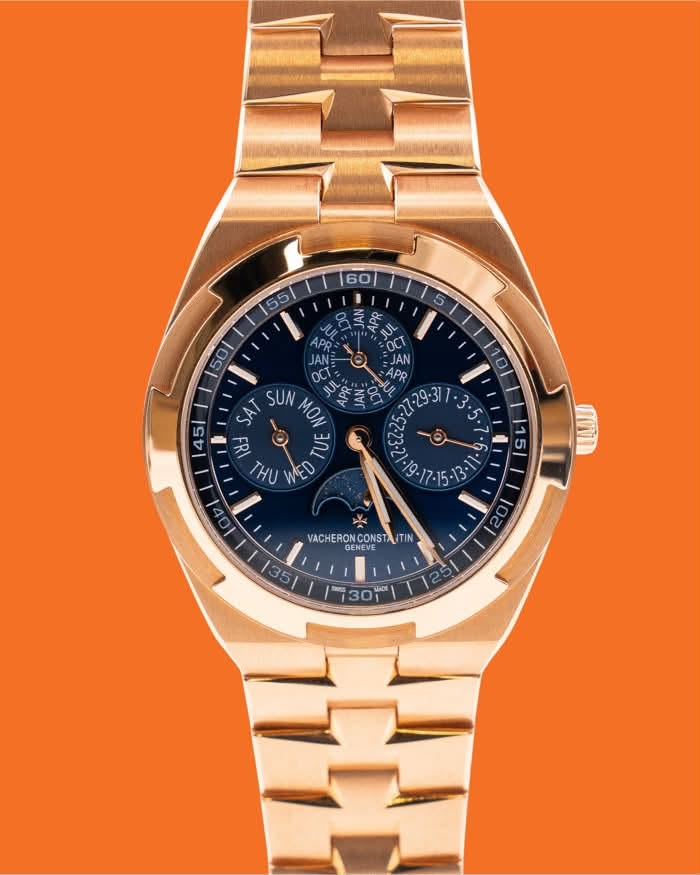 May be an image of wrist watch and text that says '60| 55/ 50 SCIAN APR 45 3. SAT SUN MON FRI IU THU WED VACHERON CONST TIN GENEV VACHERONCONSTA/TIN GENE هن 301 G 130'