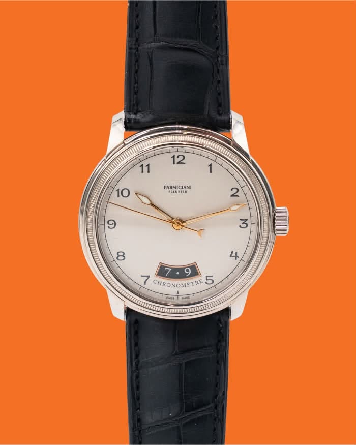 May be an image of wrist watch and text that says ' PARMIGIANI CHRONOMETRE CHRONOMET 5 0年 AE S'