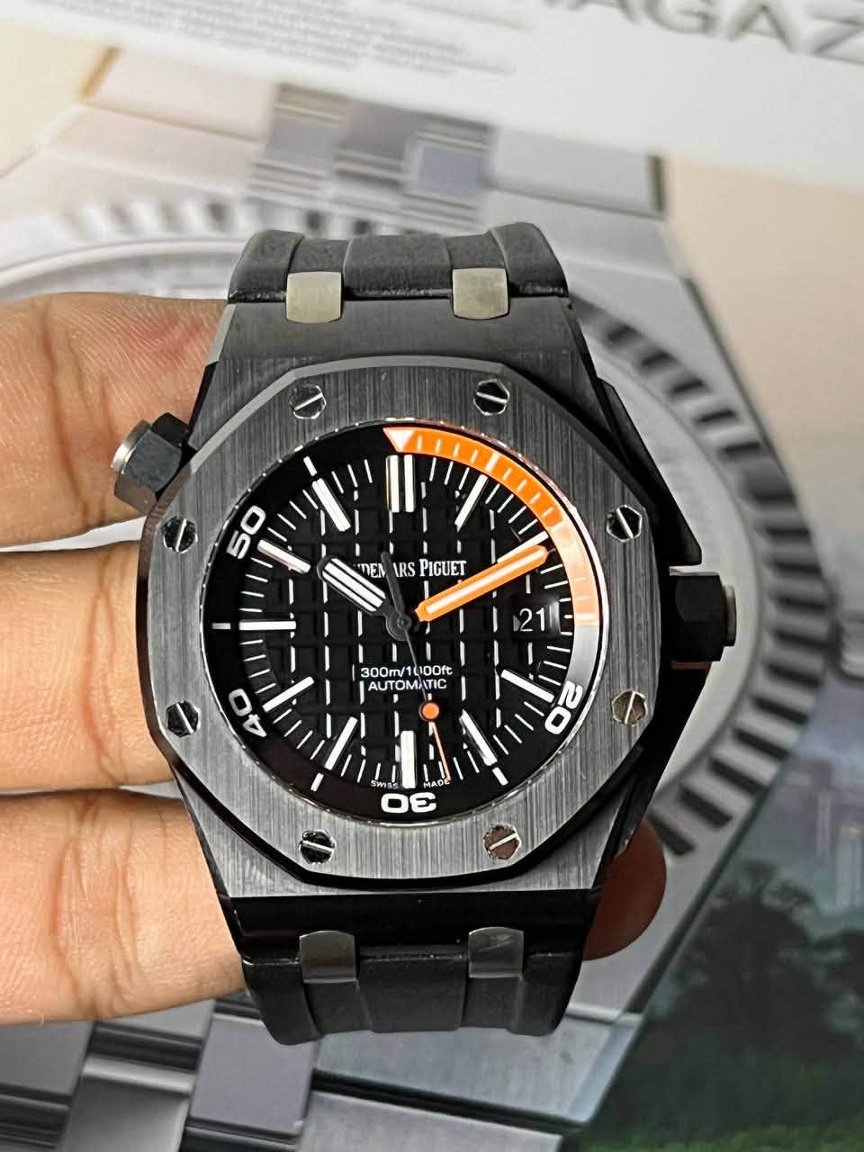 May be an image of wrist watch and text that says 'I 50 1 I NEN TEMIRSPIGUET IRS PIGUET 21 300m/1(100ft 100ft 300m/ AUT To A AUTOMA 300m/1400fe c 4C οε'