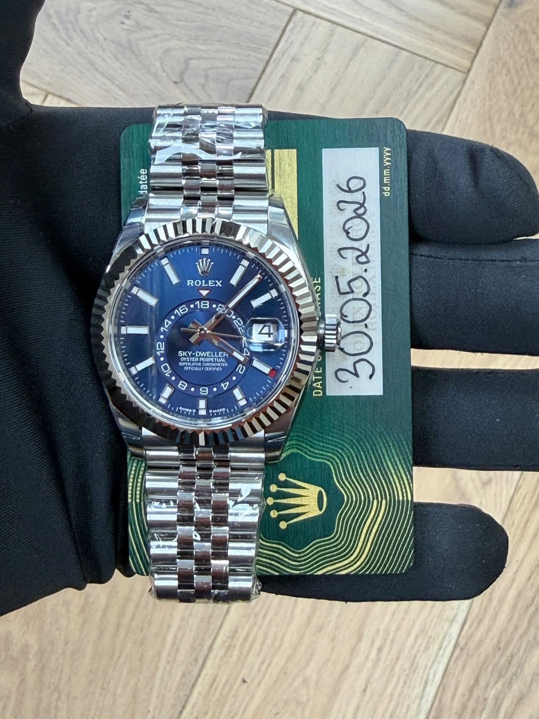 May be an image of wrist watch and text that says 'ይ2 datée ויויוי - 단지 ROLEX AA 2026 dd. mm. م A TAEE ス 12 SKY- GKY-DWELLEF ROSFAL LE C V P D 9 ー會 - 素 A ス ះរតុ'