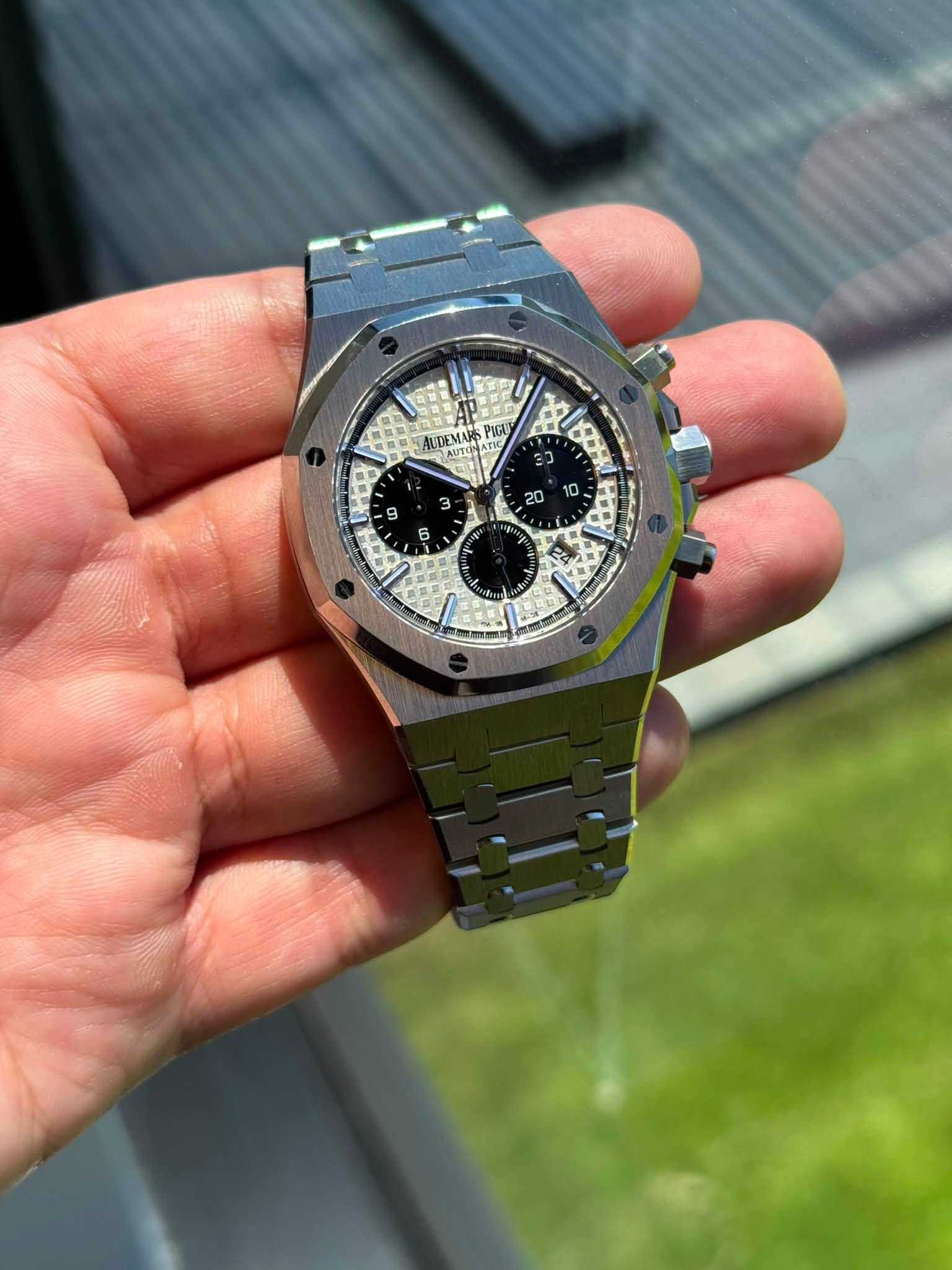 May be an image of wrist watch and text