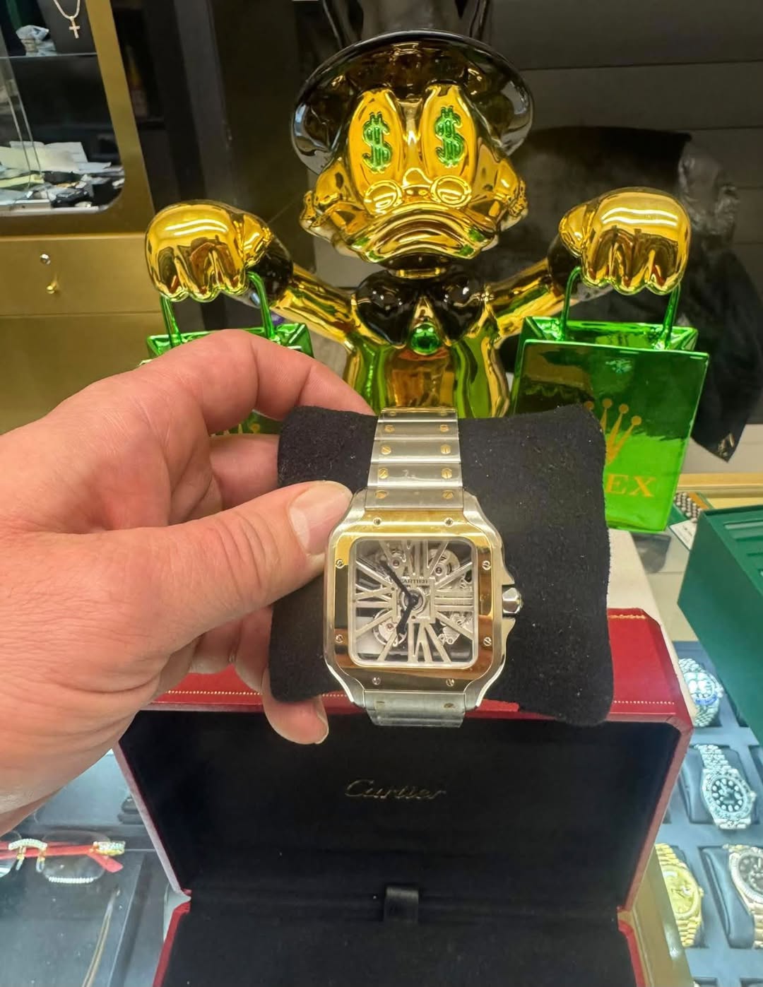 May be an image of digital watch and text
