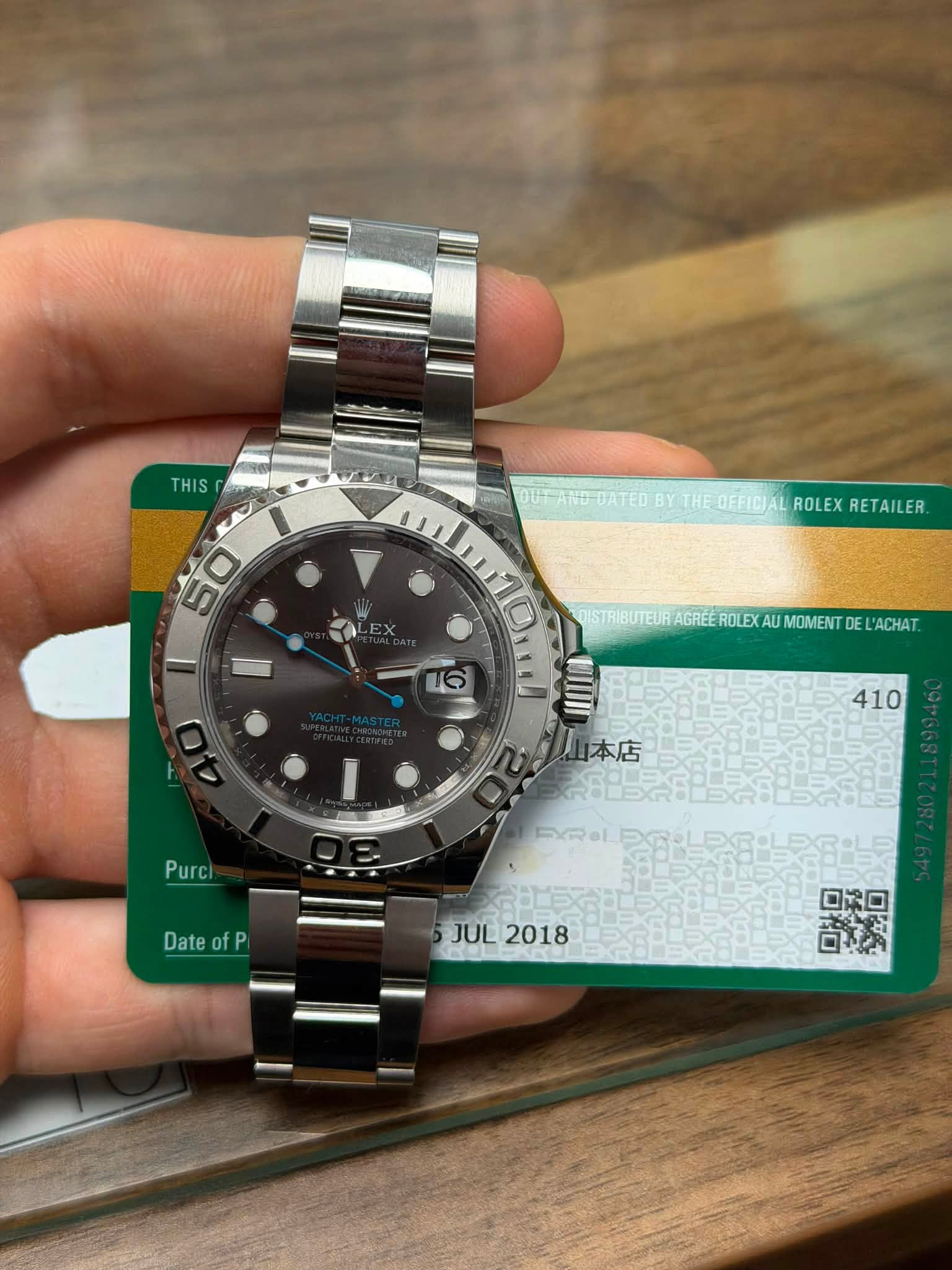 May be an image of wrist watch and text