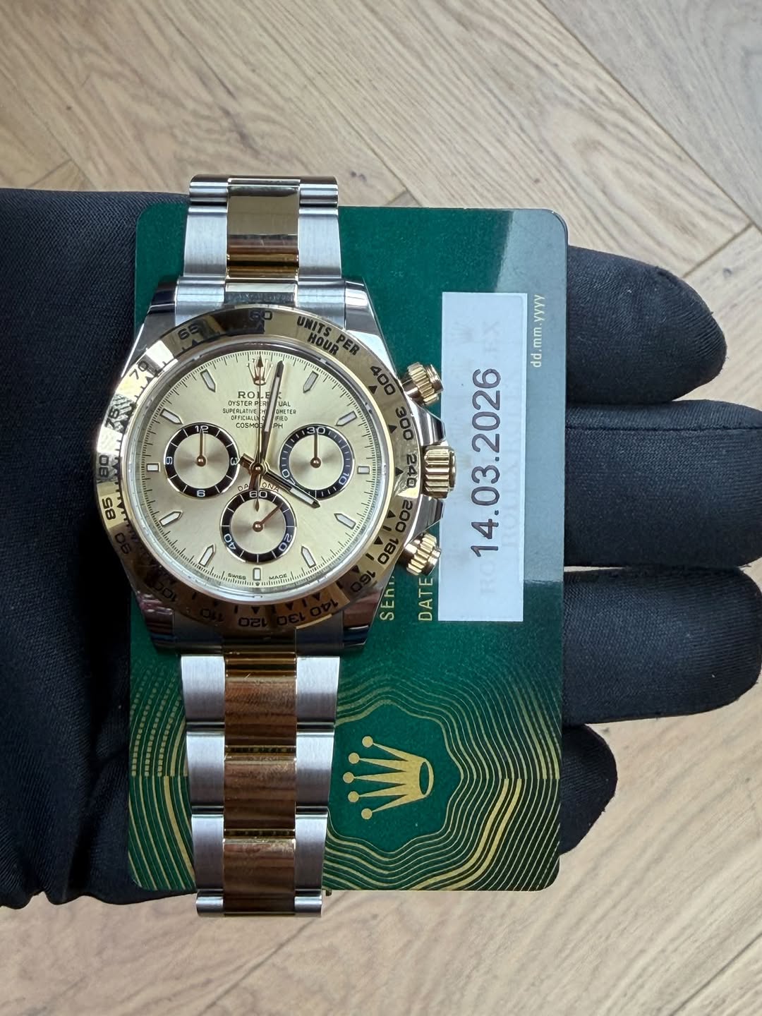 May be an image of wrist watch and text