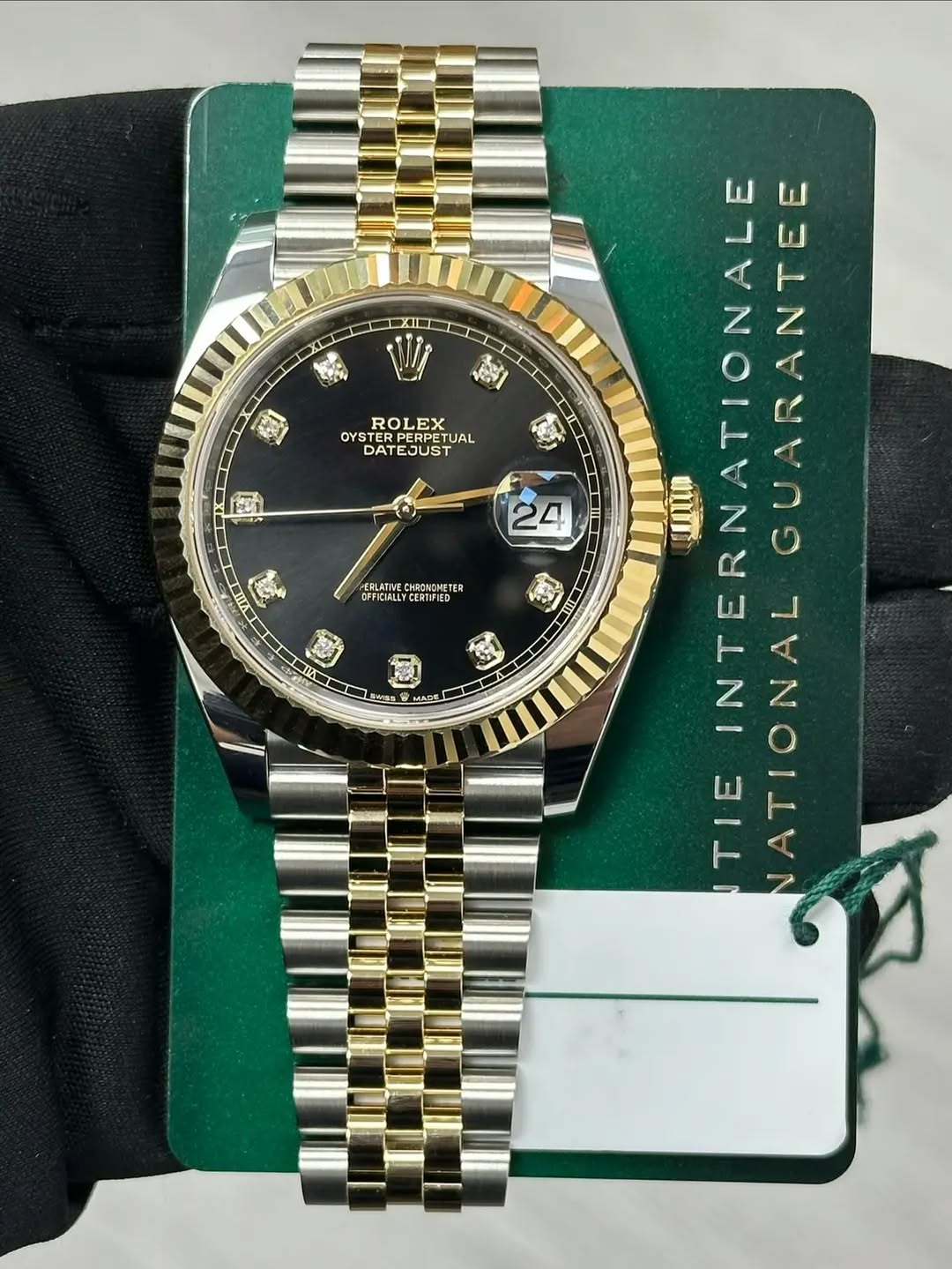 May be an image of wrist watch and text