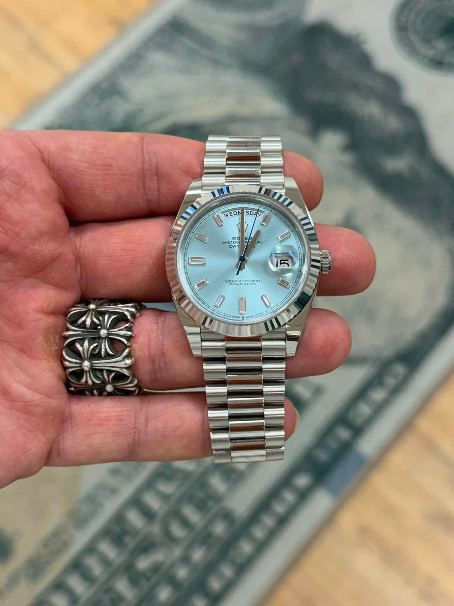 May be an image of wrist watch and text