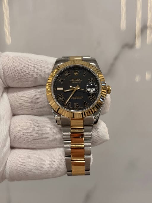 May be an image of wrist watch