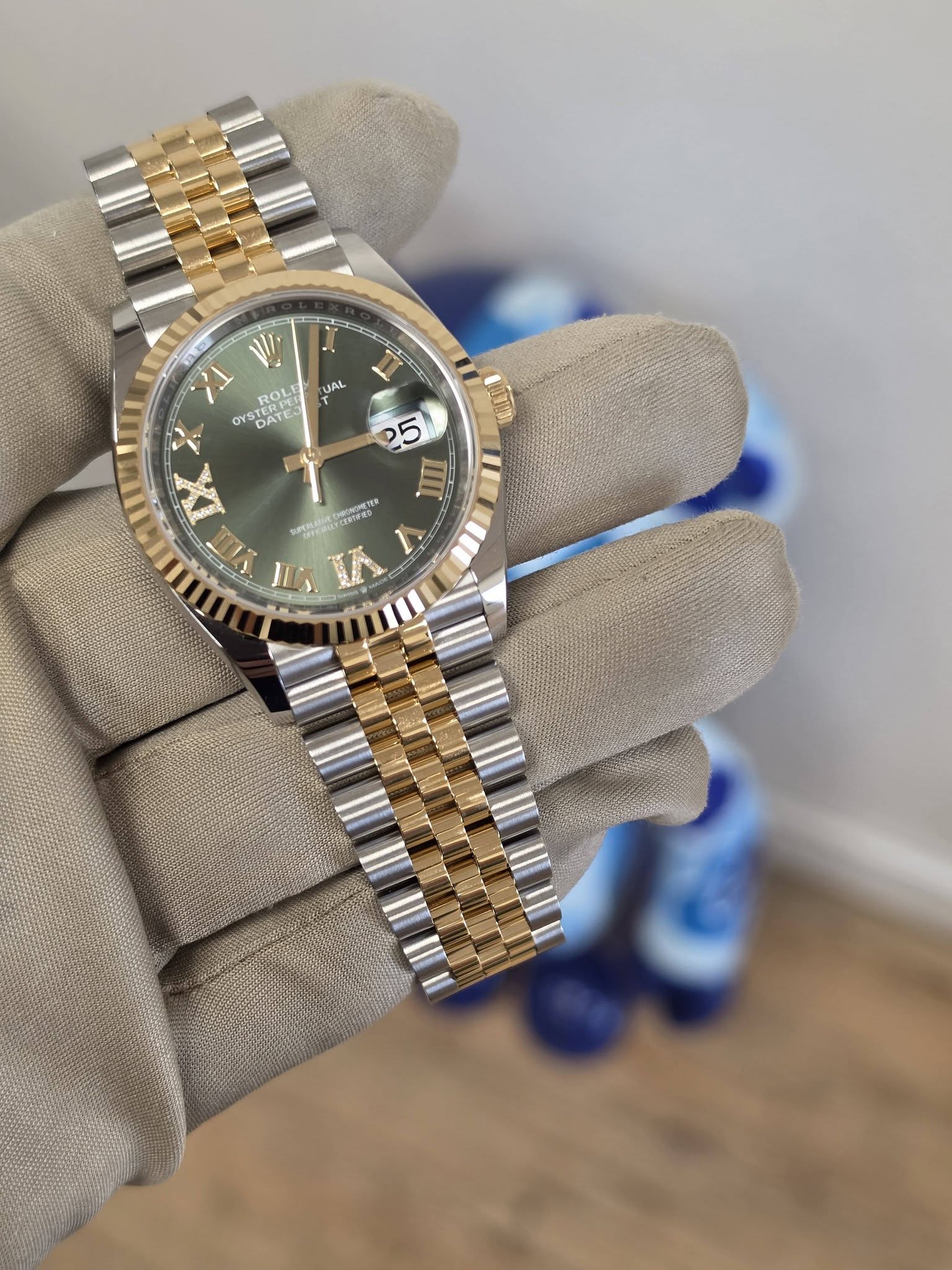 May be an image of wrist watch and text