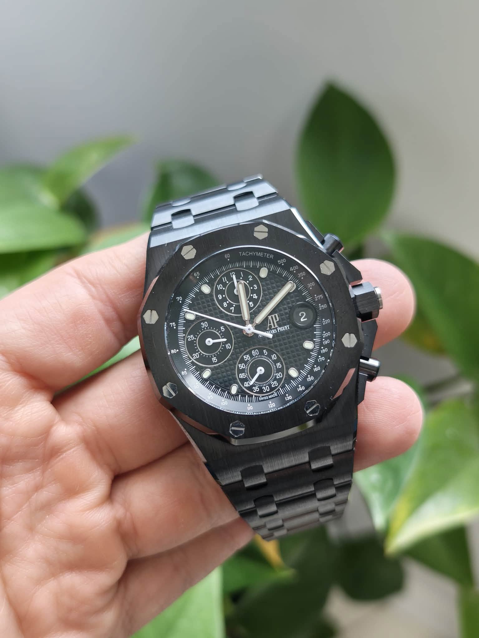 May be an image of wrist watch and text