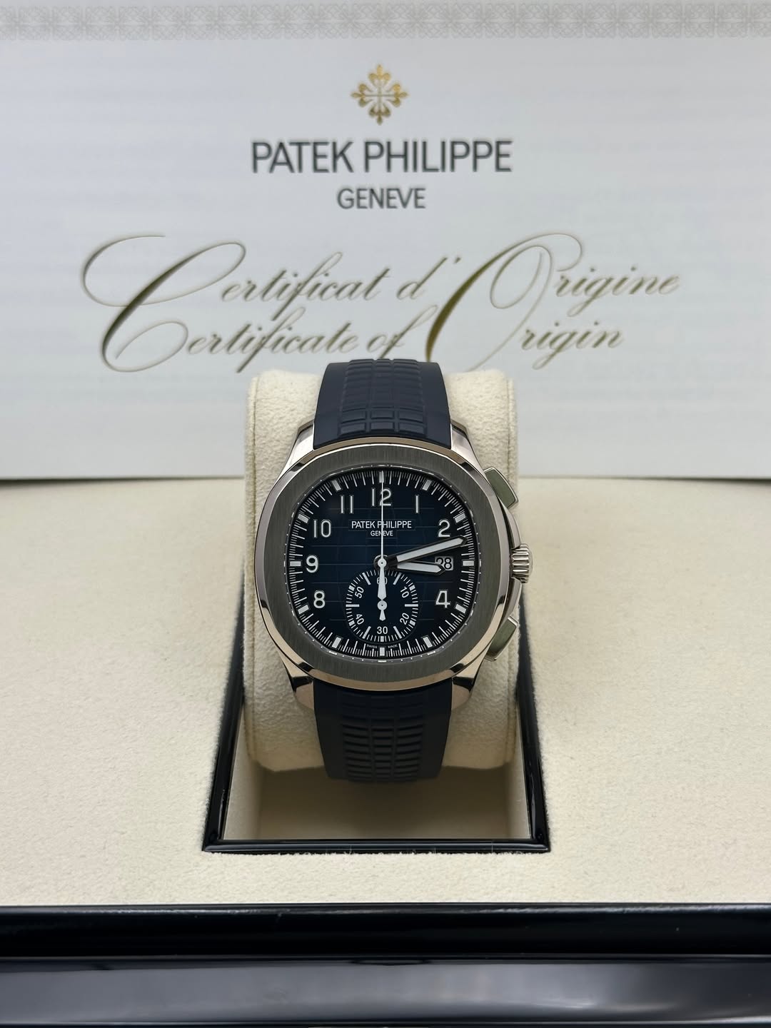 May be an image of wrist watch and text that says '樂 PATEK PATEKPHILIPPE PHILIPPE GENEVE CTyфиm tifical Orizine Dertificated rigin PAT 10 LPPE 家 2 9 8 吉 - る 4 8 ''ግሃት : 1 ရ VE'