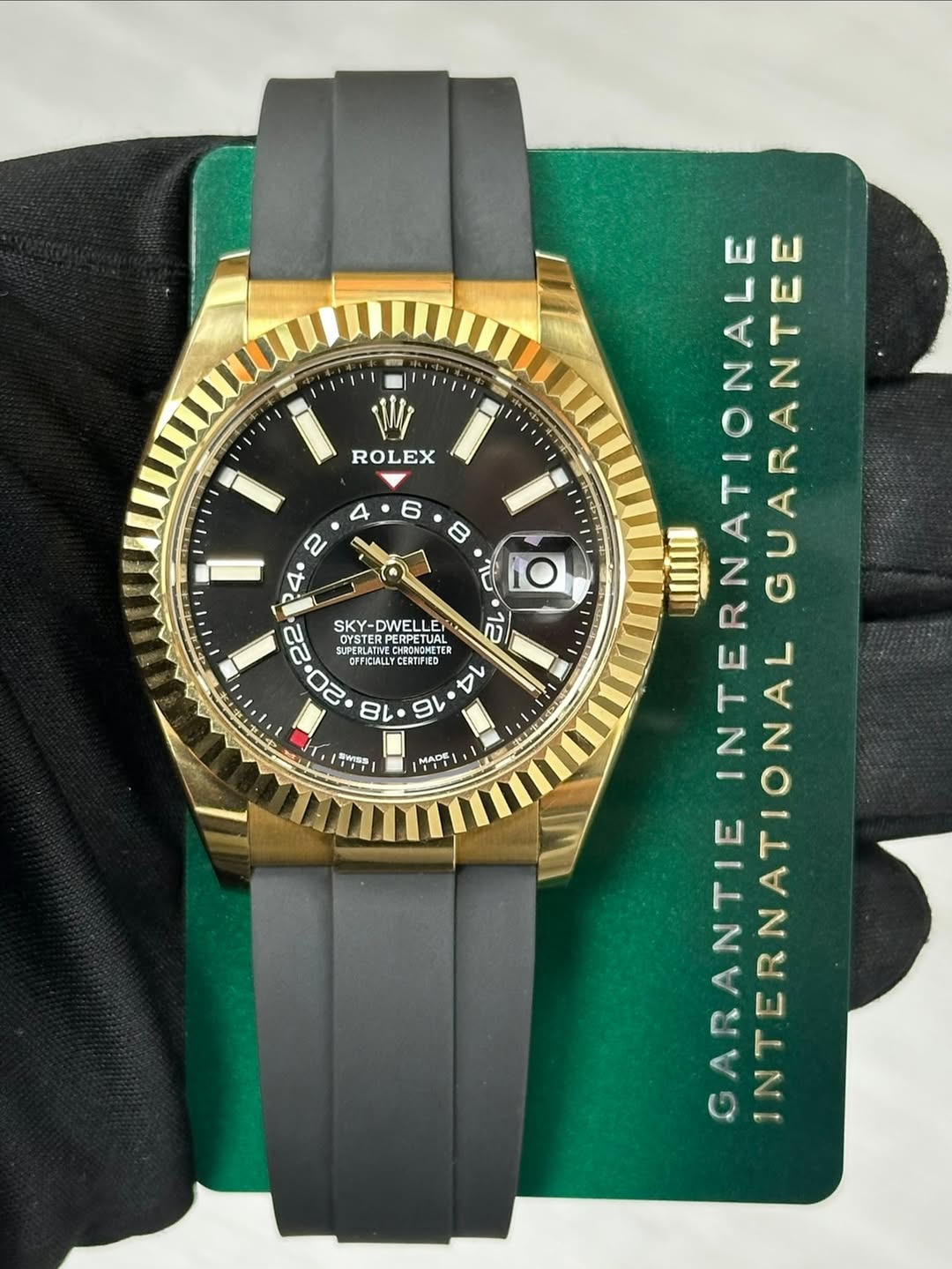 May be an image of wrist watch and text