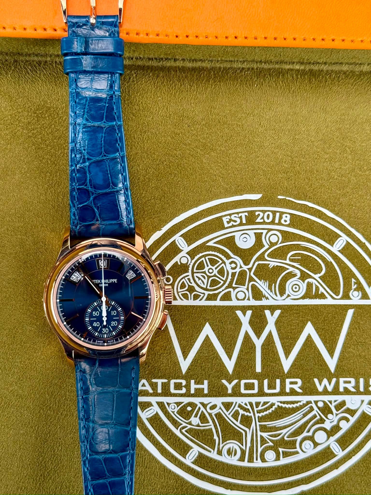 May be an image of wrist watch, leather and text that says 'EST 2018 TFK TEKTHUIPPE LIPPE CAU PTIT 地 10 0 I I UIIII WY ATOH YOUR WRI'