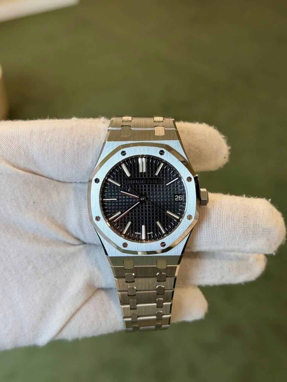 May be an image of wrist watch and text