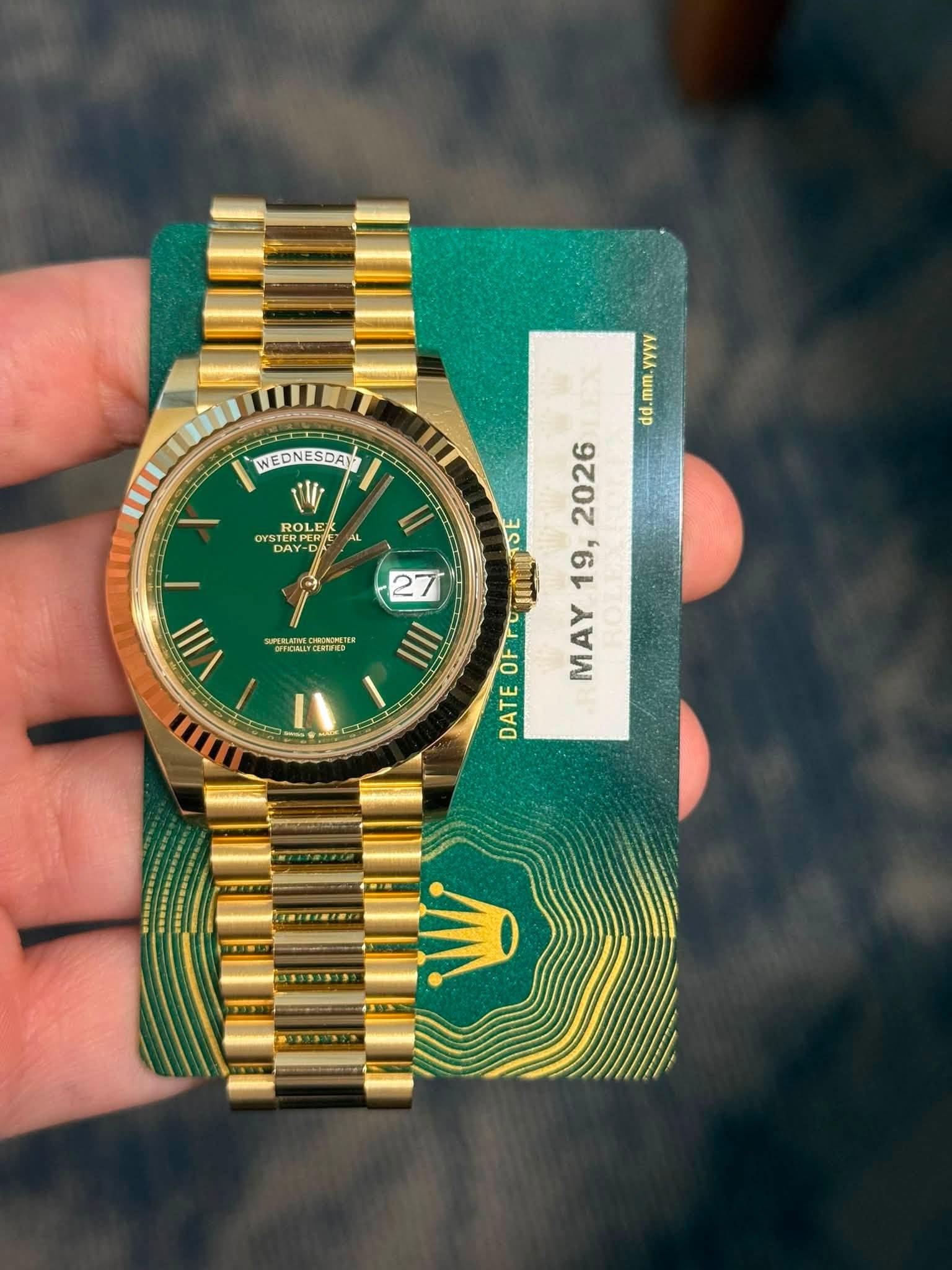 May be an image of wrist watch and text