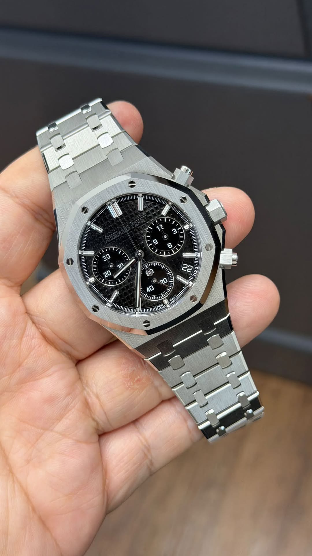 May be an image of wrist watch and text