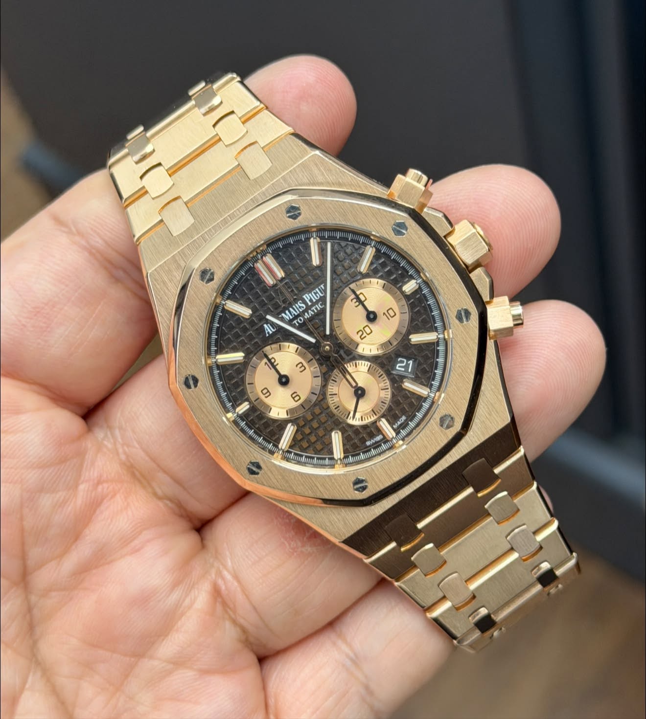 May be an image of wrist watch and text