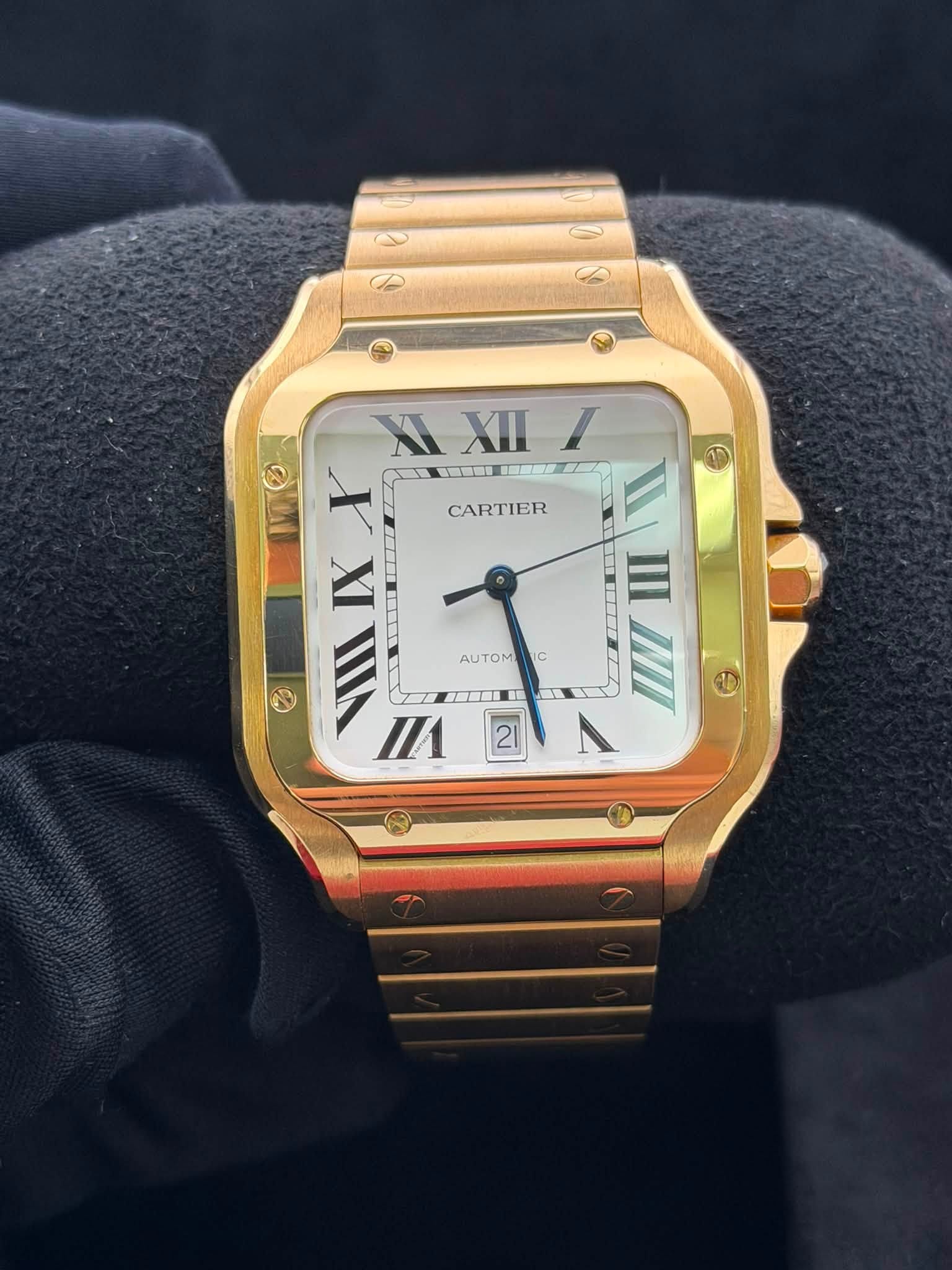 May be an image of wrist watch and text