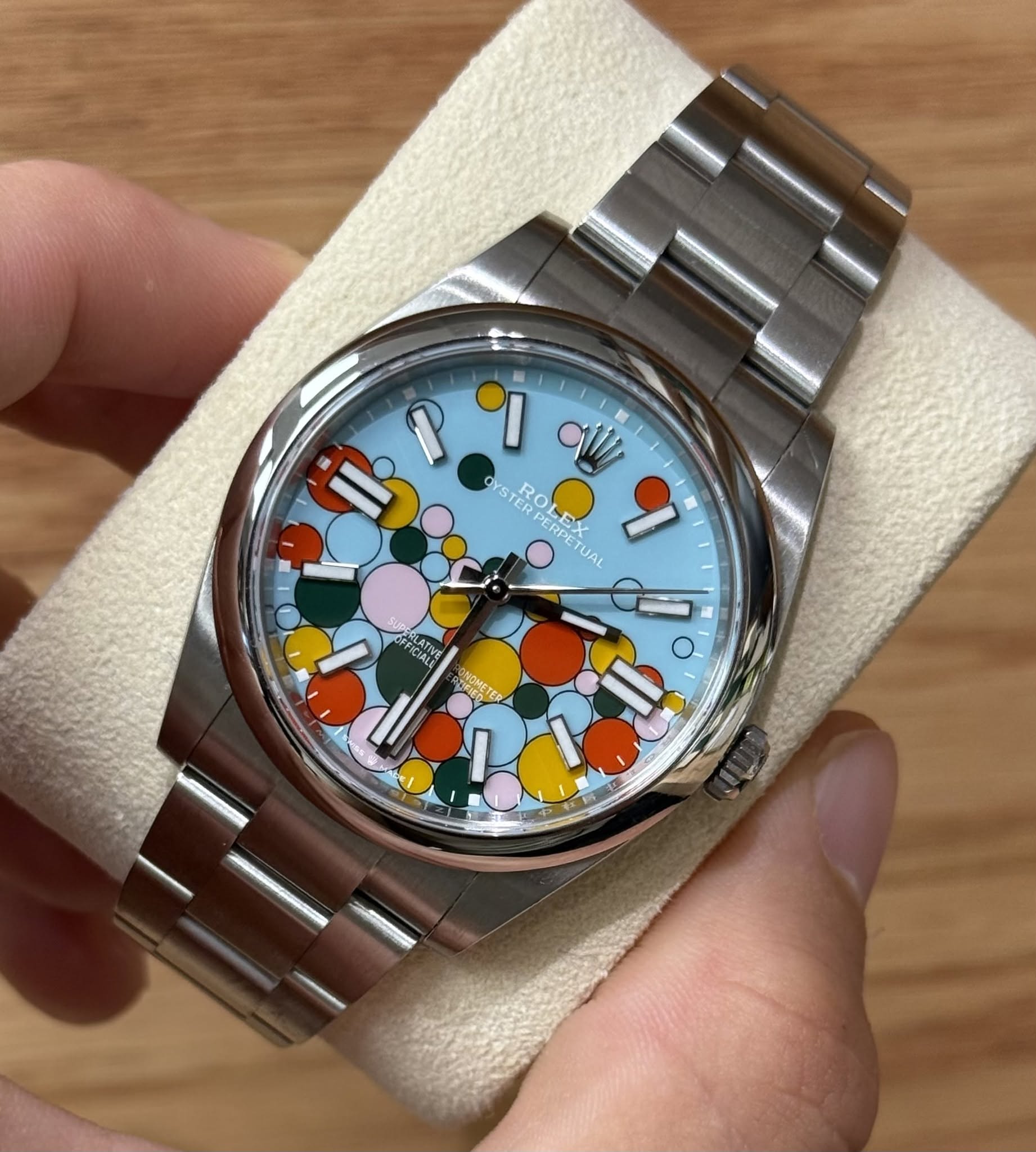 May be an image of wrist watch and text