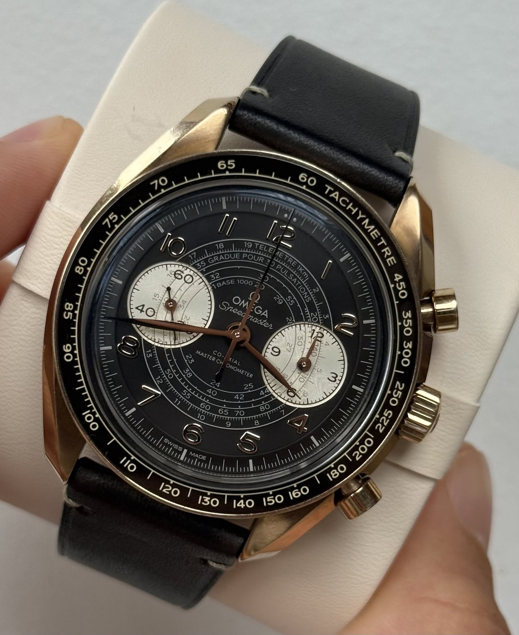 May be an image of wrist watch and text