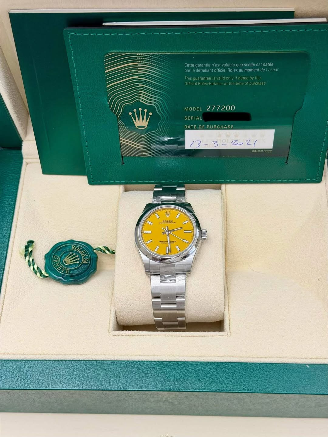 May be an image of wrist watch and text