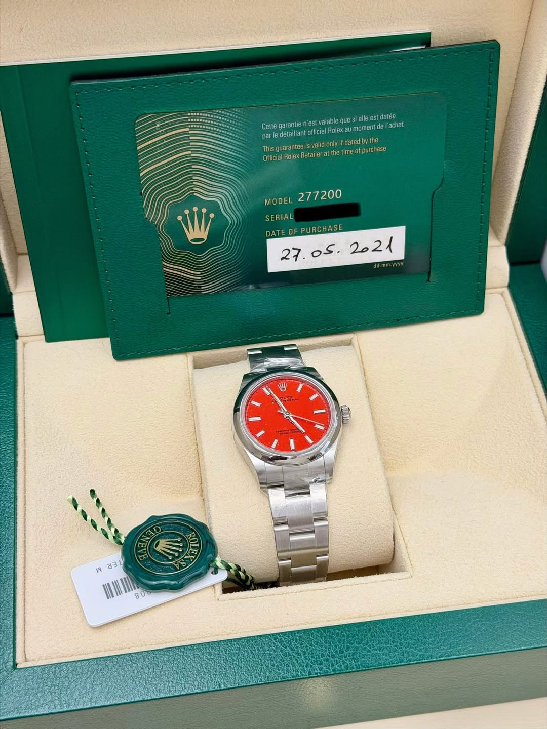 May be an image of wrist watch and text