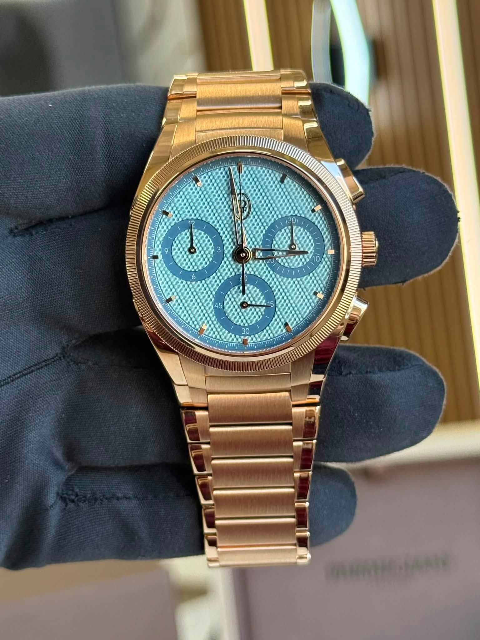 May be an image of wrist watch and text