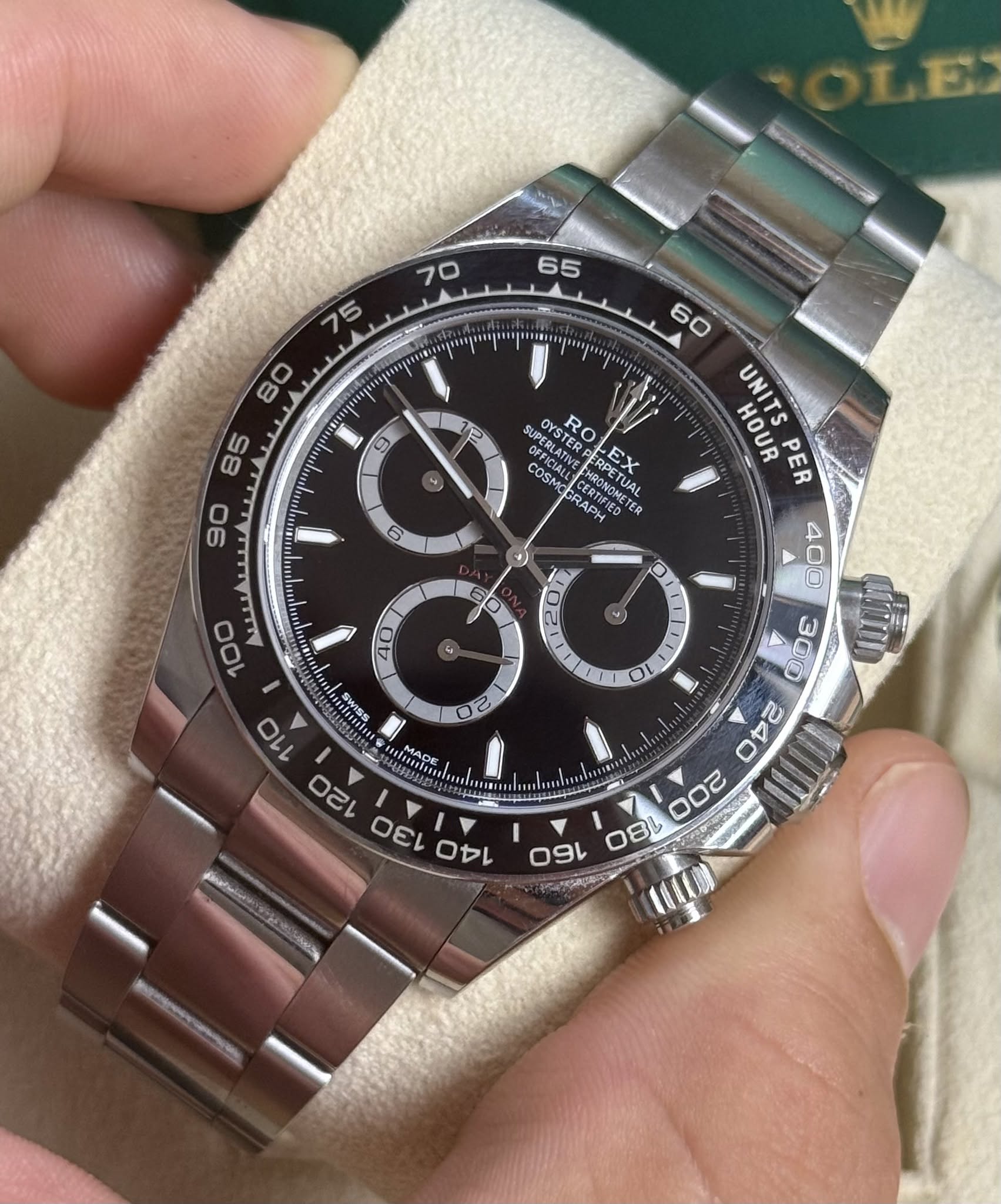 May be an image of wrist watch and text