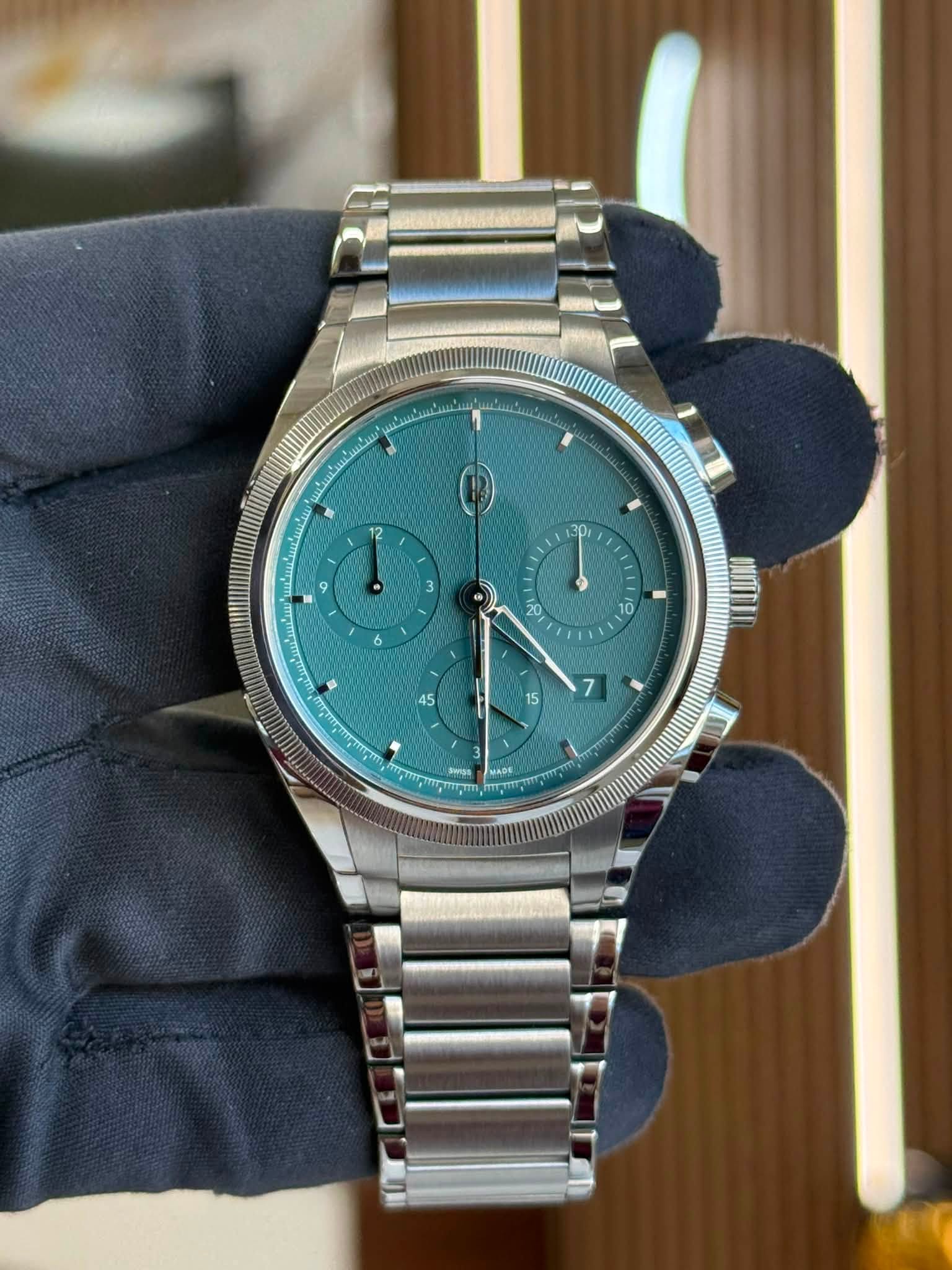 May be an image of wrist watch and text